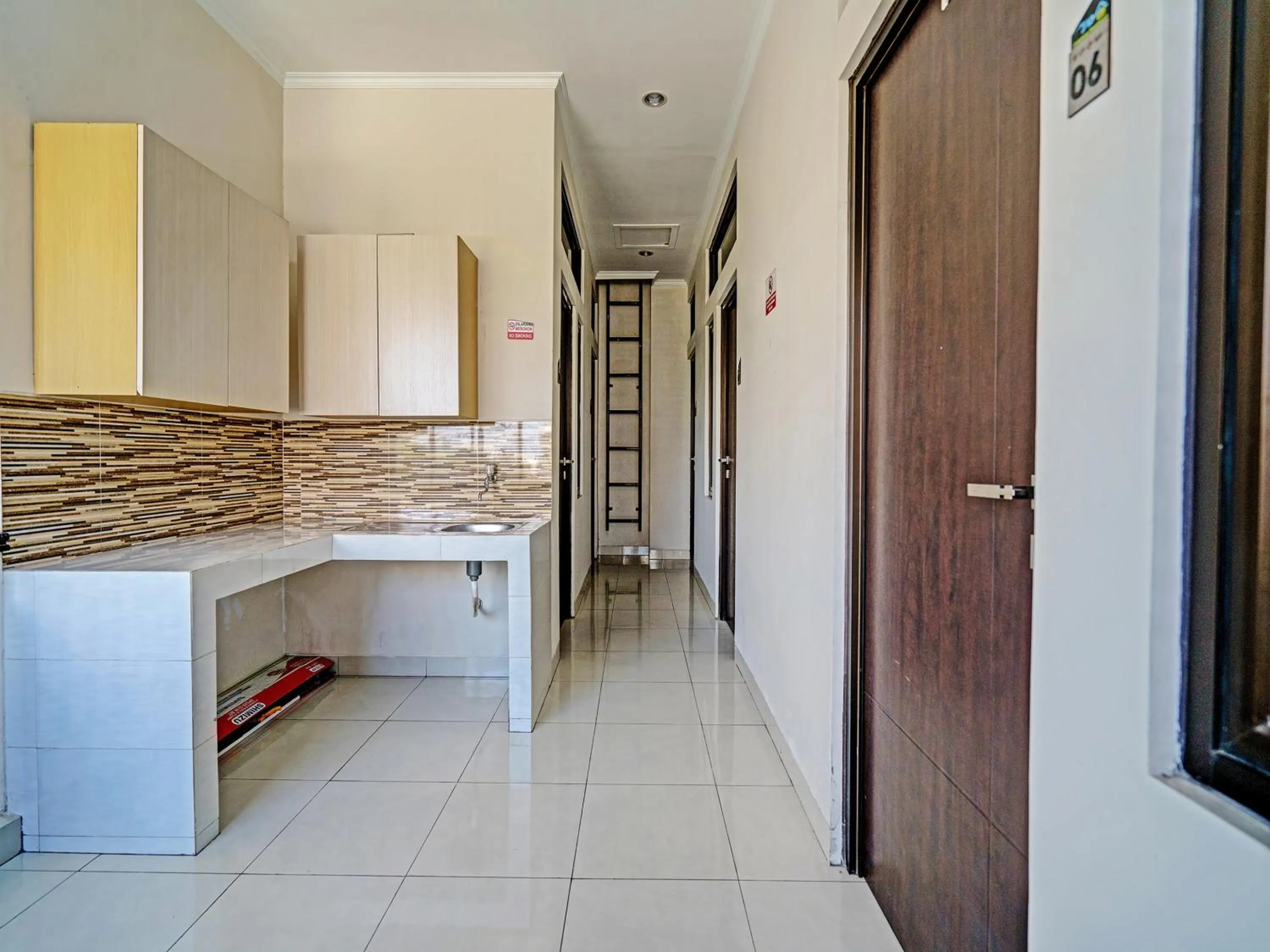 Kitchen or kitchenette in Hotel O Losmen Diah Syariah