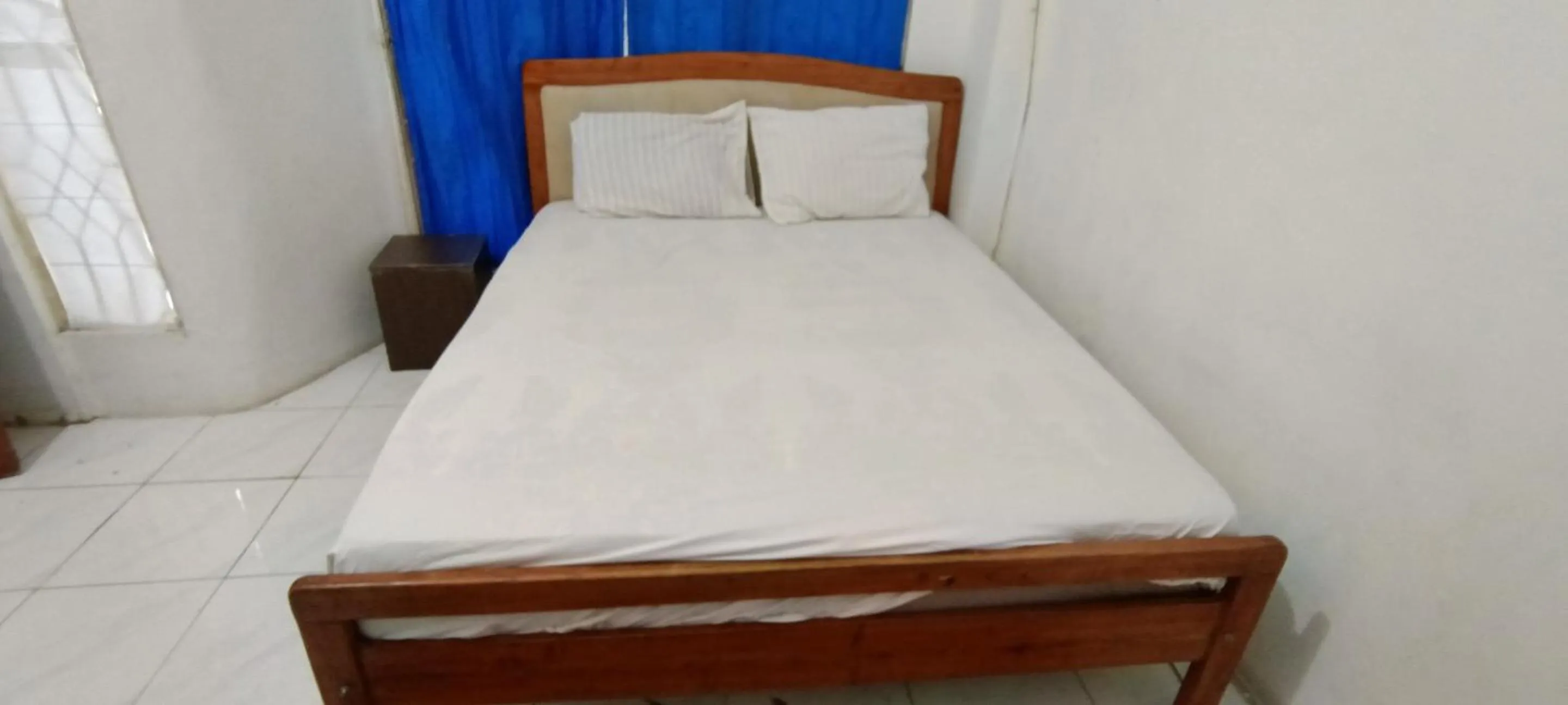 Bedroom, Bed in Hotel O Losmen Griya Mulia Katingan Kuala