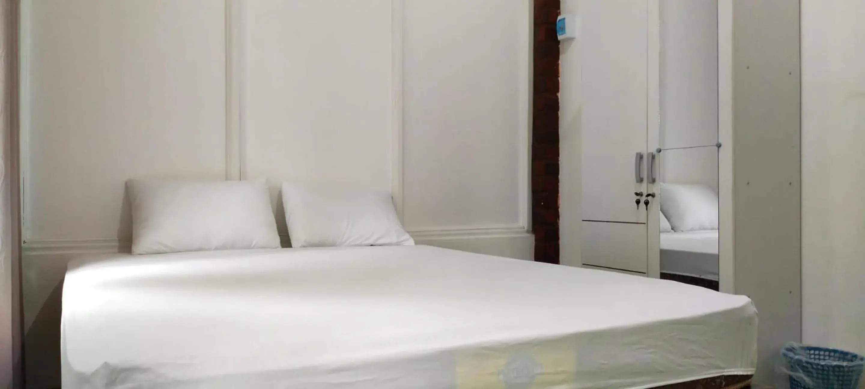 Bedroom, Bed in Hotel O Losmen Griya Mulia Katingan Kuala Bedroom, Bed in Hotel O Losmen Griya Mulia Katingan Kuala