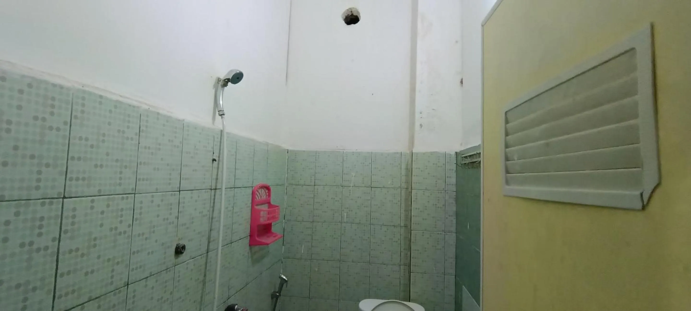 Bathroom in Hotel O Losmen Griya Mulia Katingan Kuala