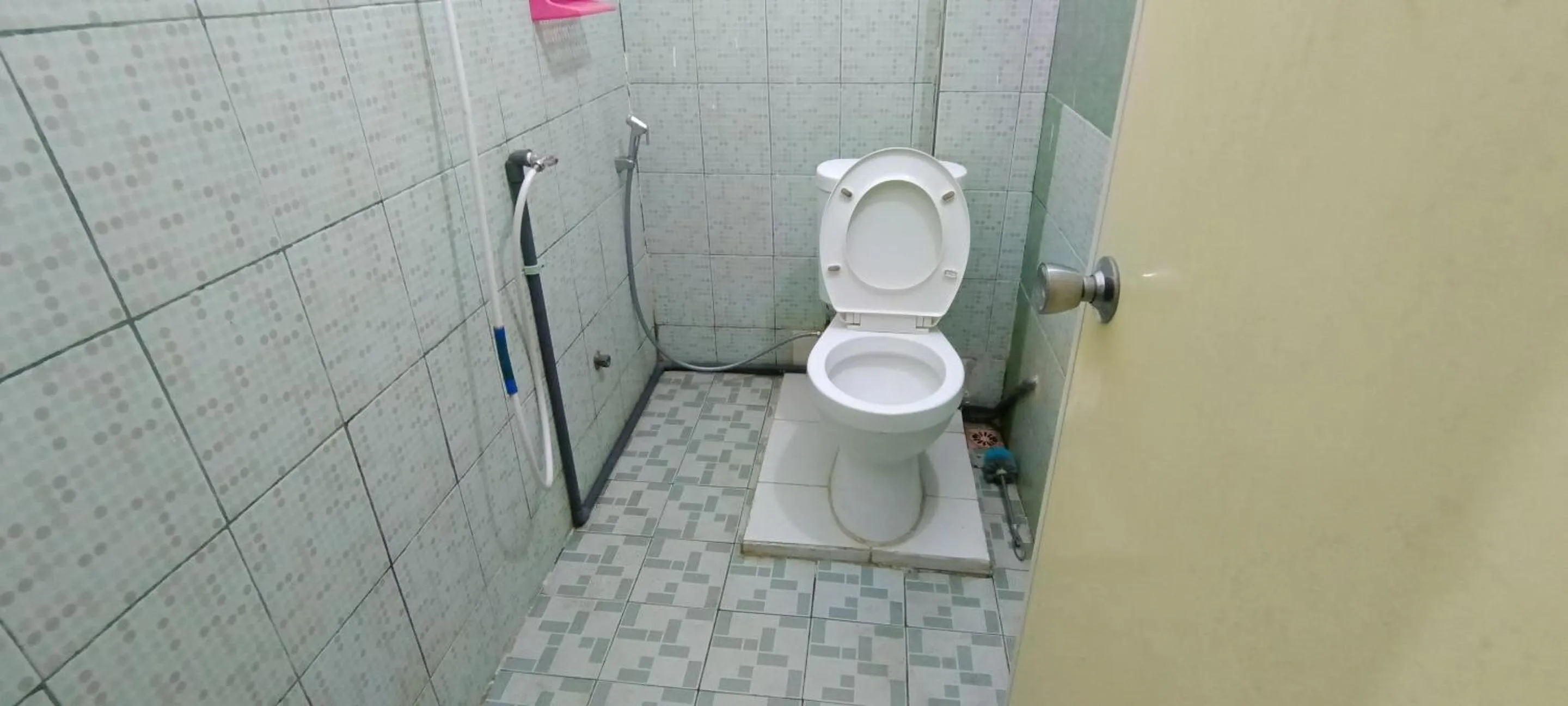 Bathroom in Hotel O Losmen Griya Mulia Katingan Kuala