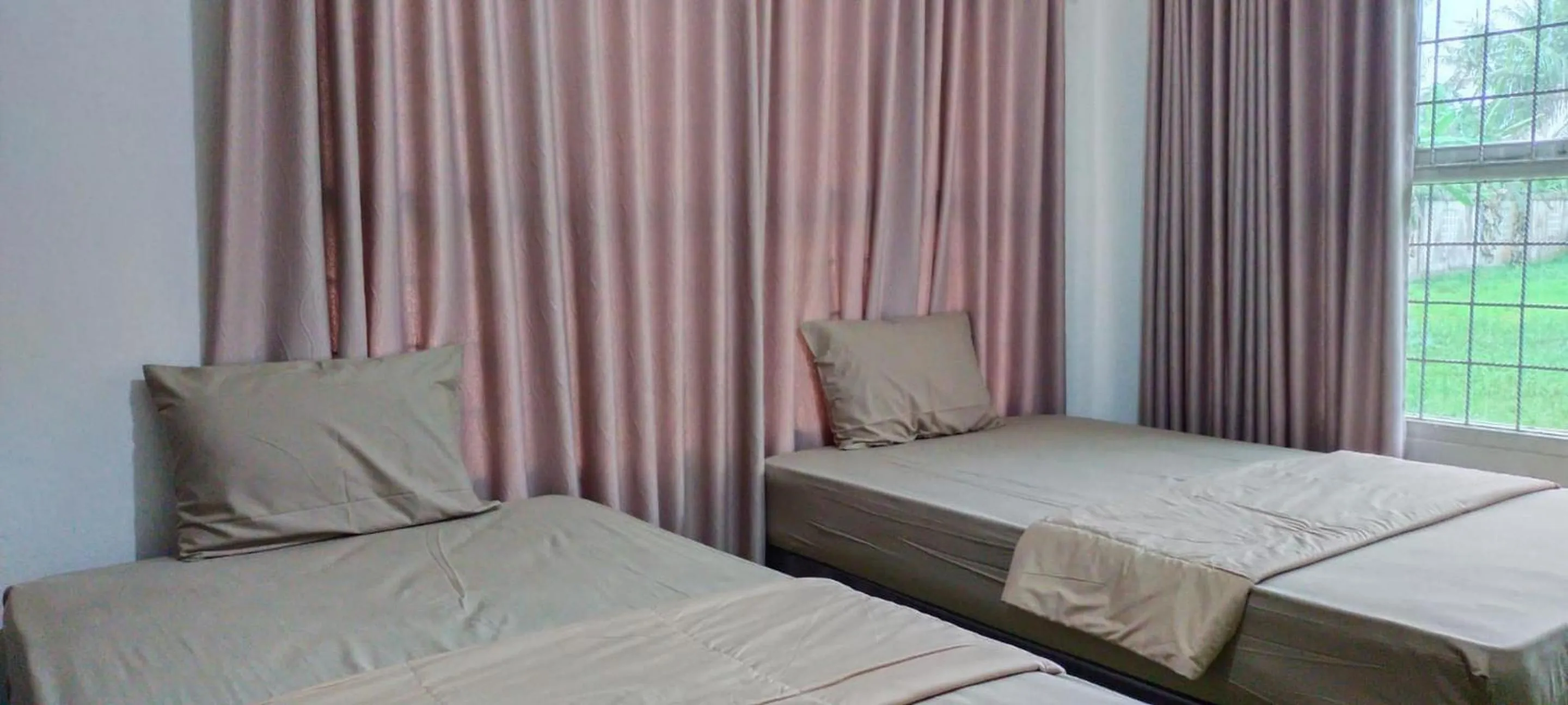 Bedroom, Bed in Hotel O Losmen Griya Mulia Katingan Kuala