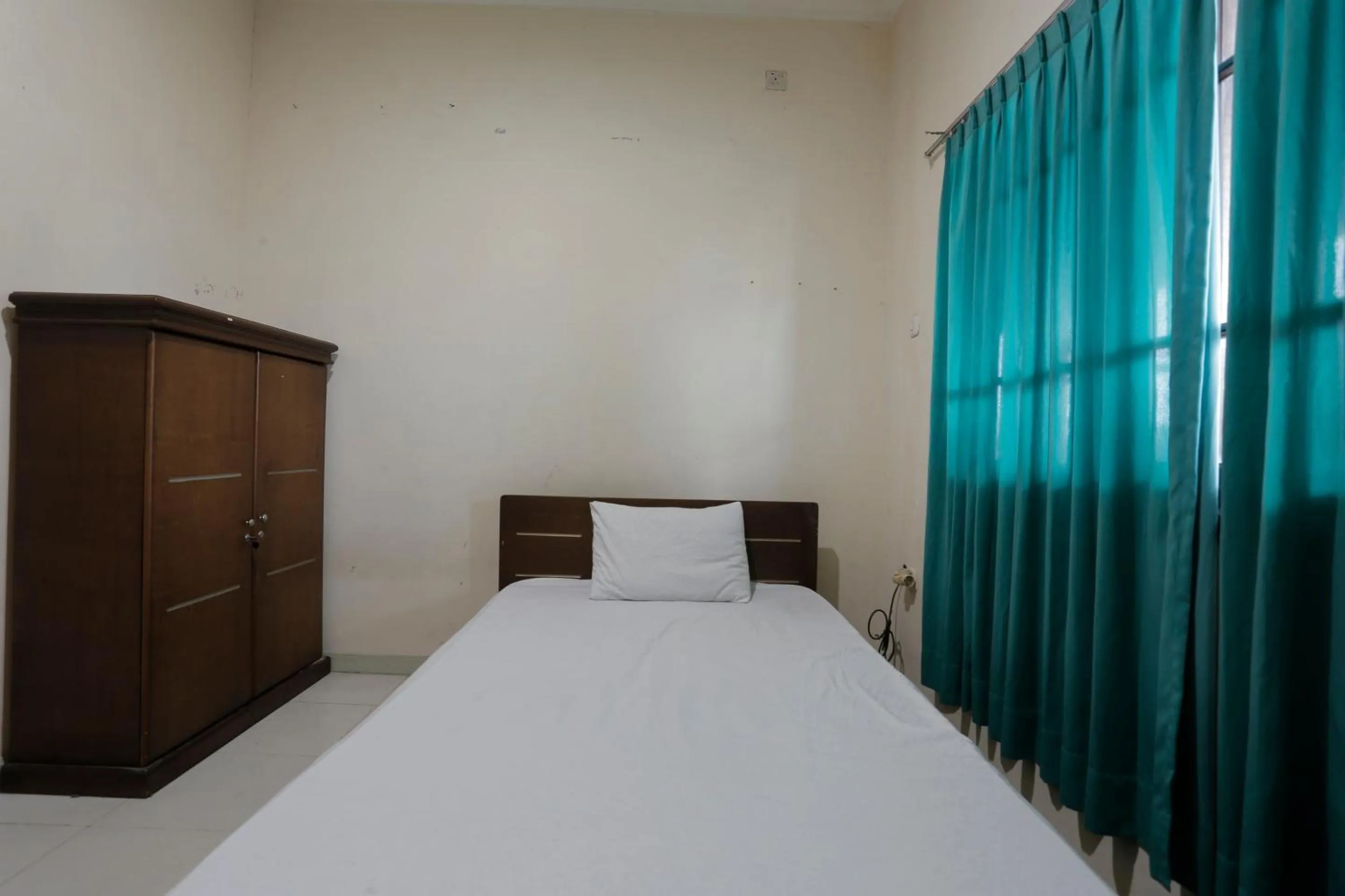 Bedroom, Bed in Hotel O Rumah Kost Kita Tarakan