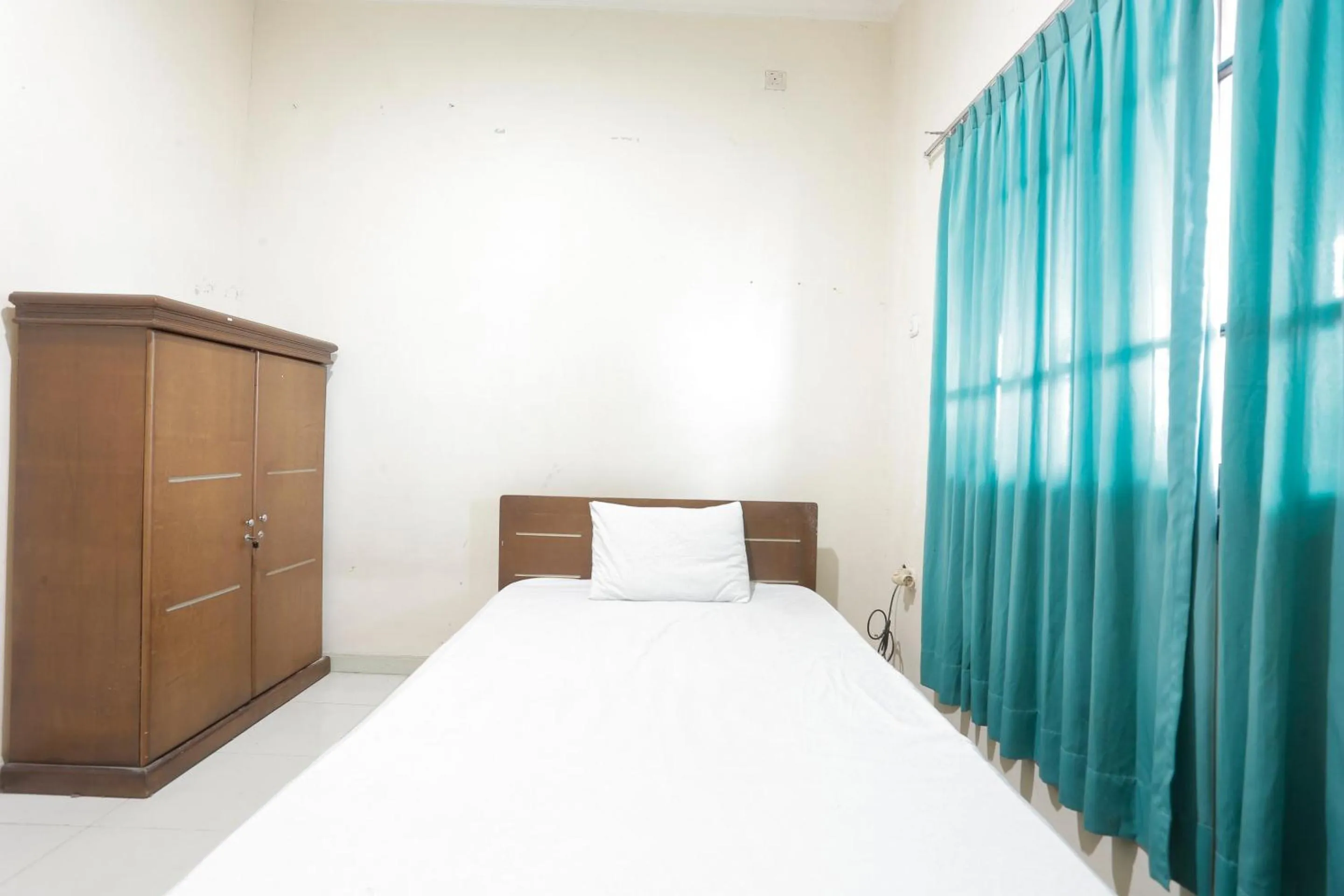 Bedroom, Bed in Hotel O Rumah Kost Kita Tarakan