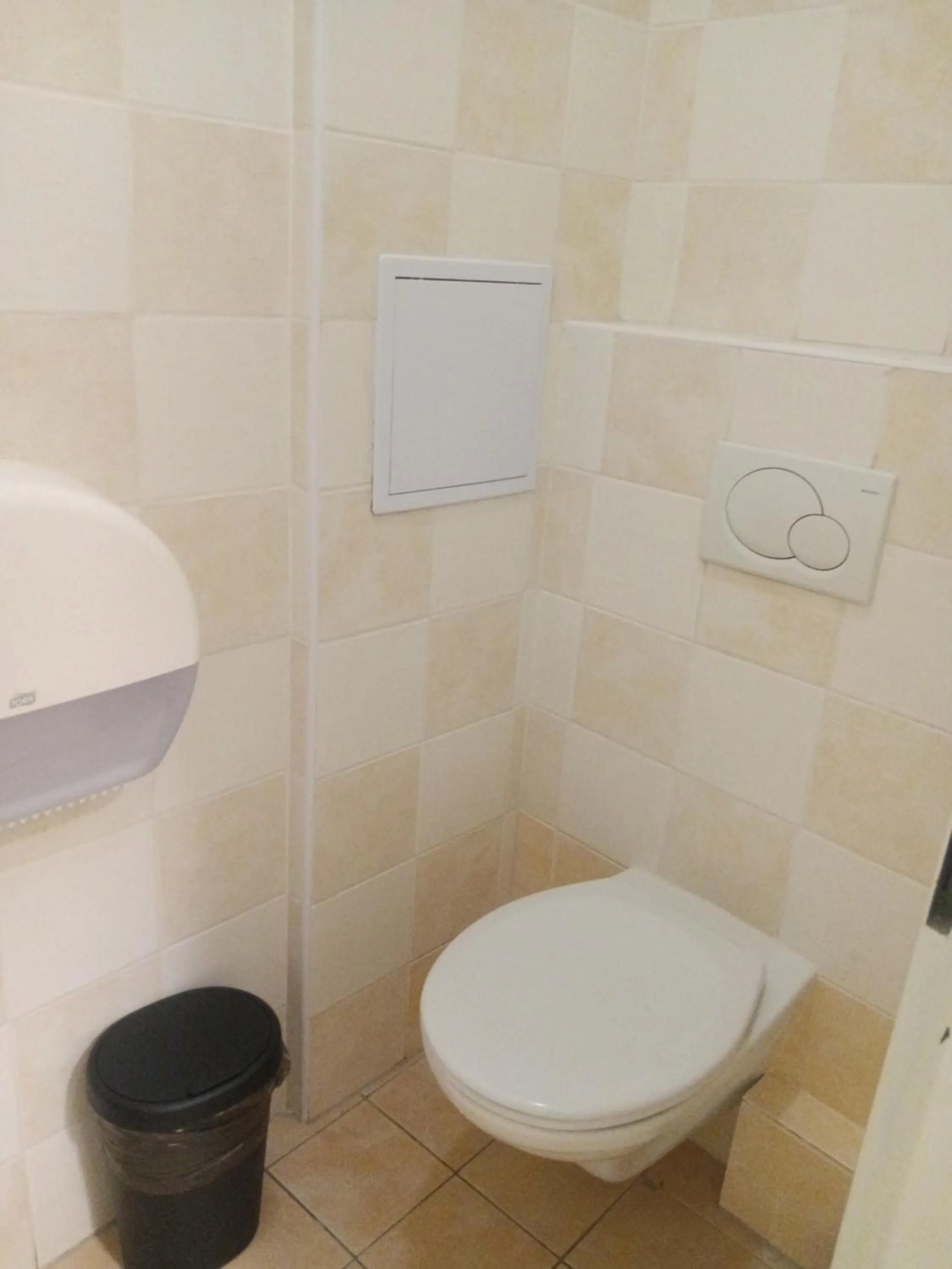 Toilet in Powder Tower Suites