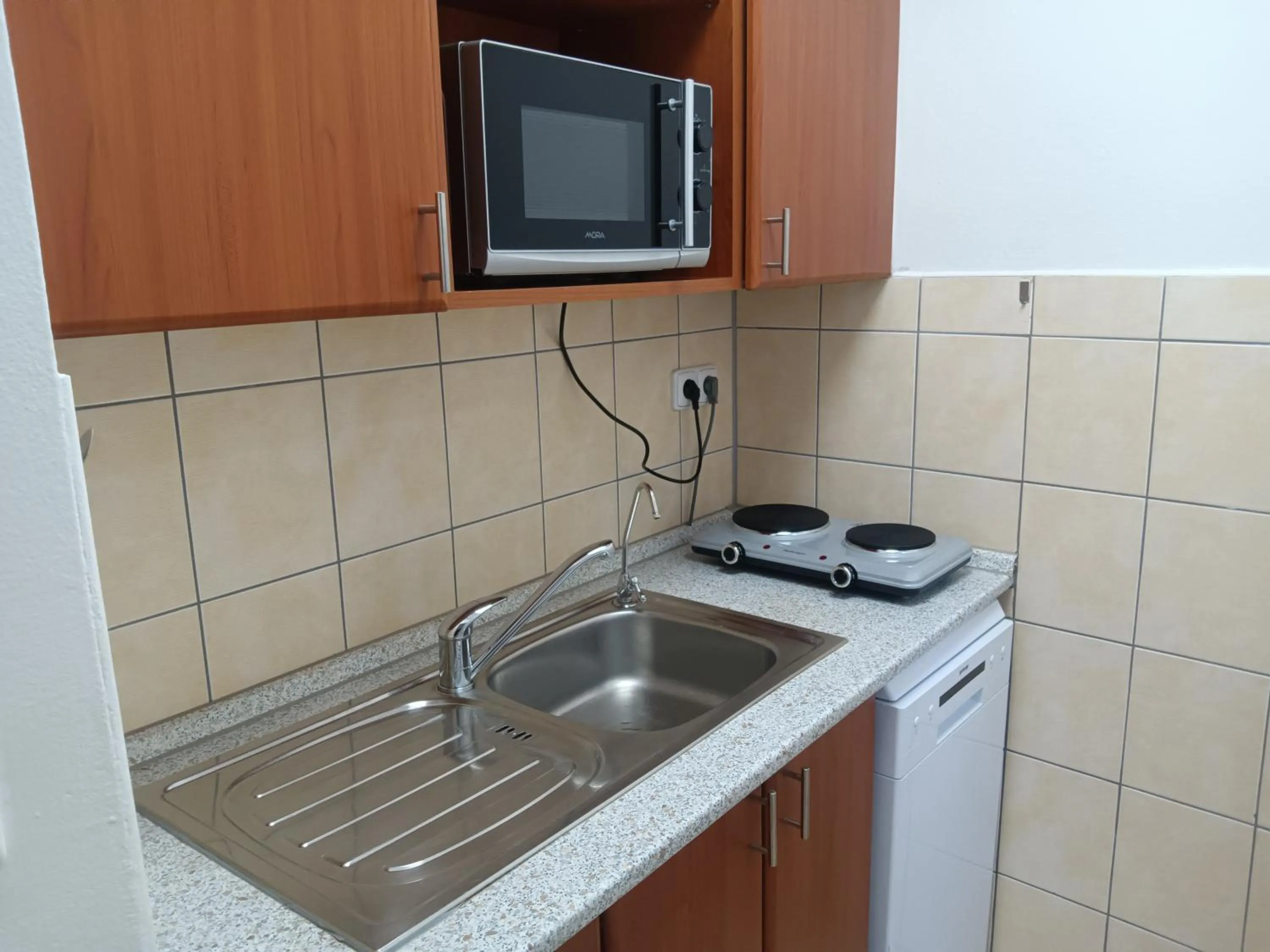 Kitchen or kitchenette in Powder Tower Suites