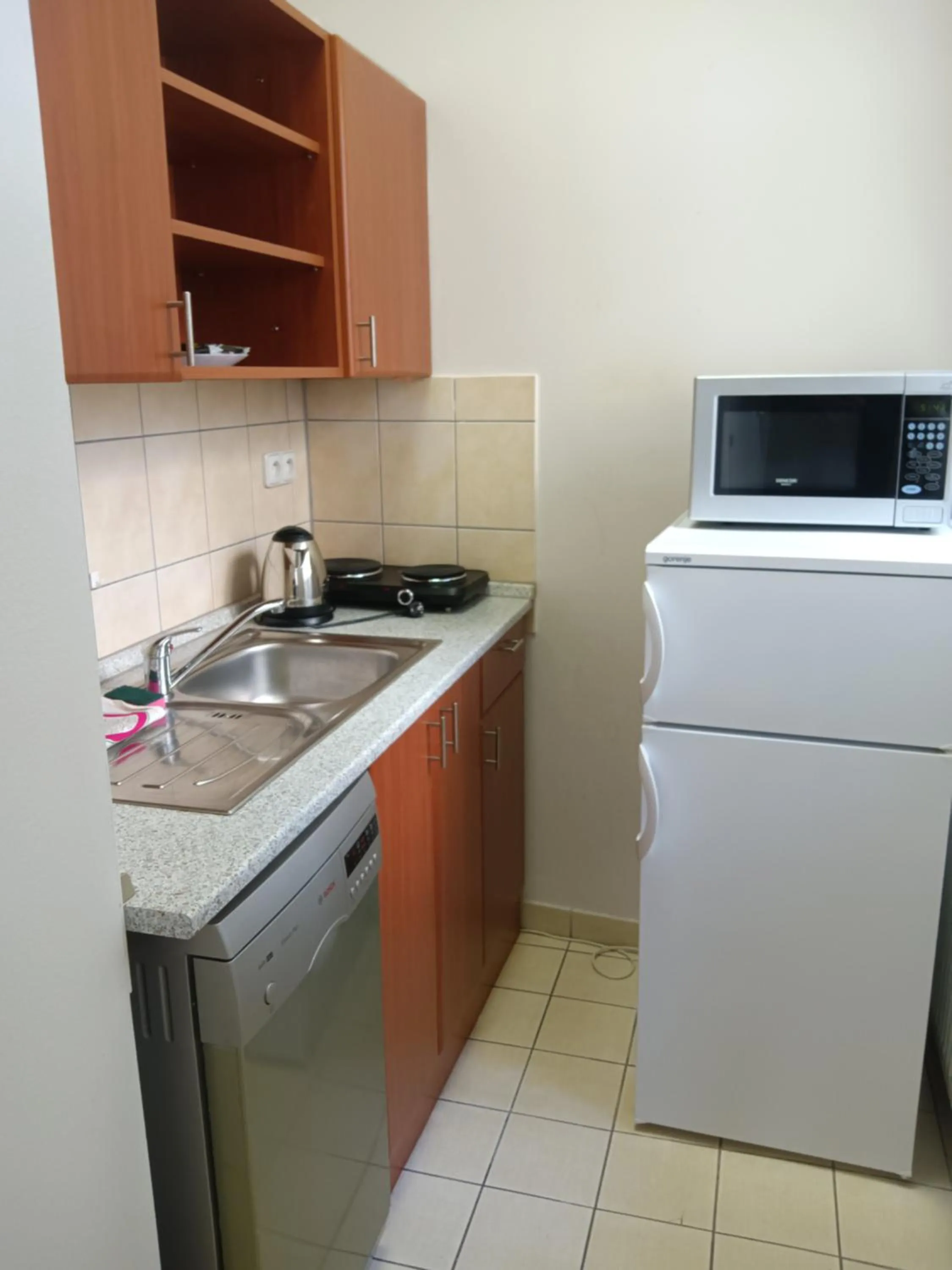 Kitchen or kitchenette in Powder Tower Suites
