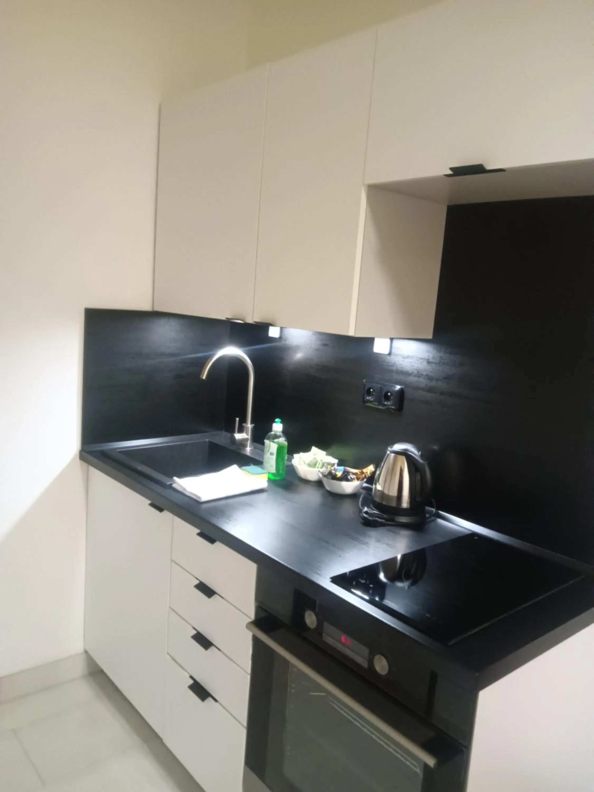 Kitchen or kitchenette in Powder Tower Suites