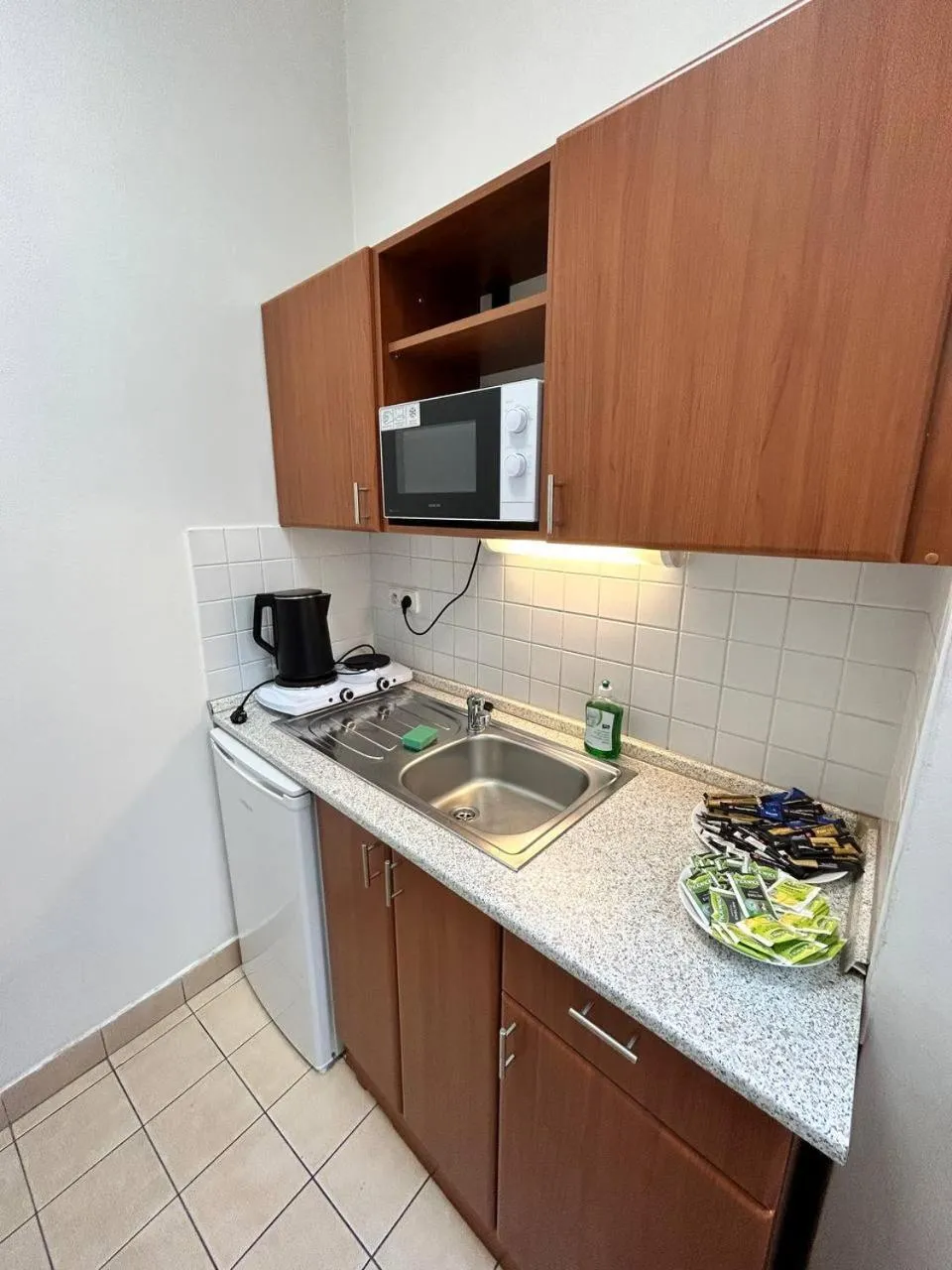 Kitchen or kitchenette in Powder Tower Suites