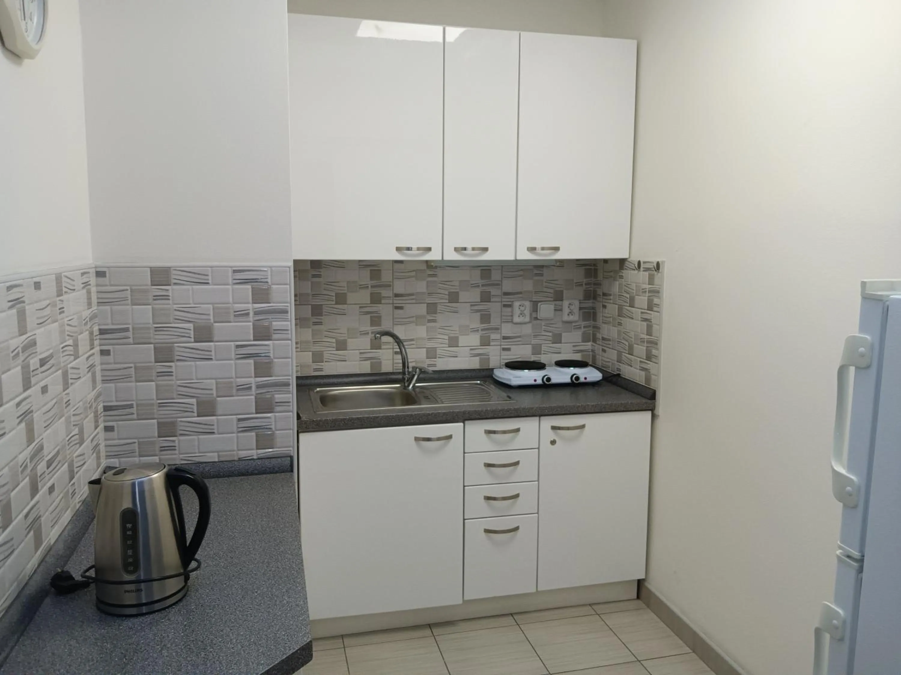 Kitchen or kitchenette in Powder Tower Suites