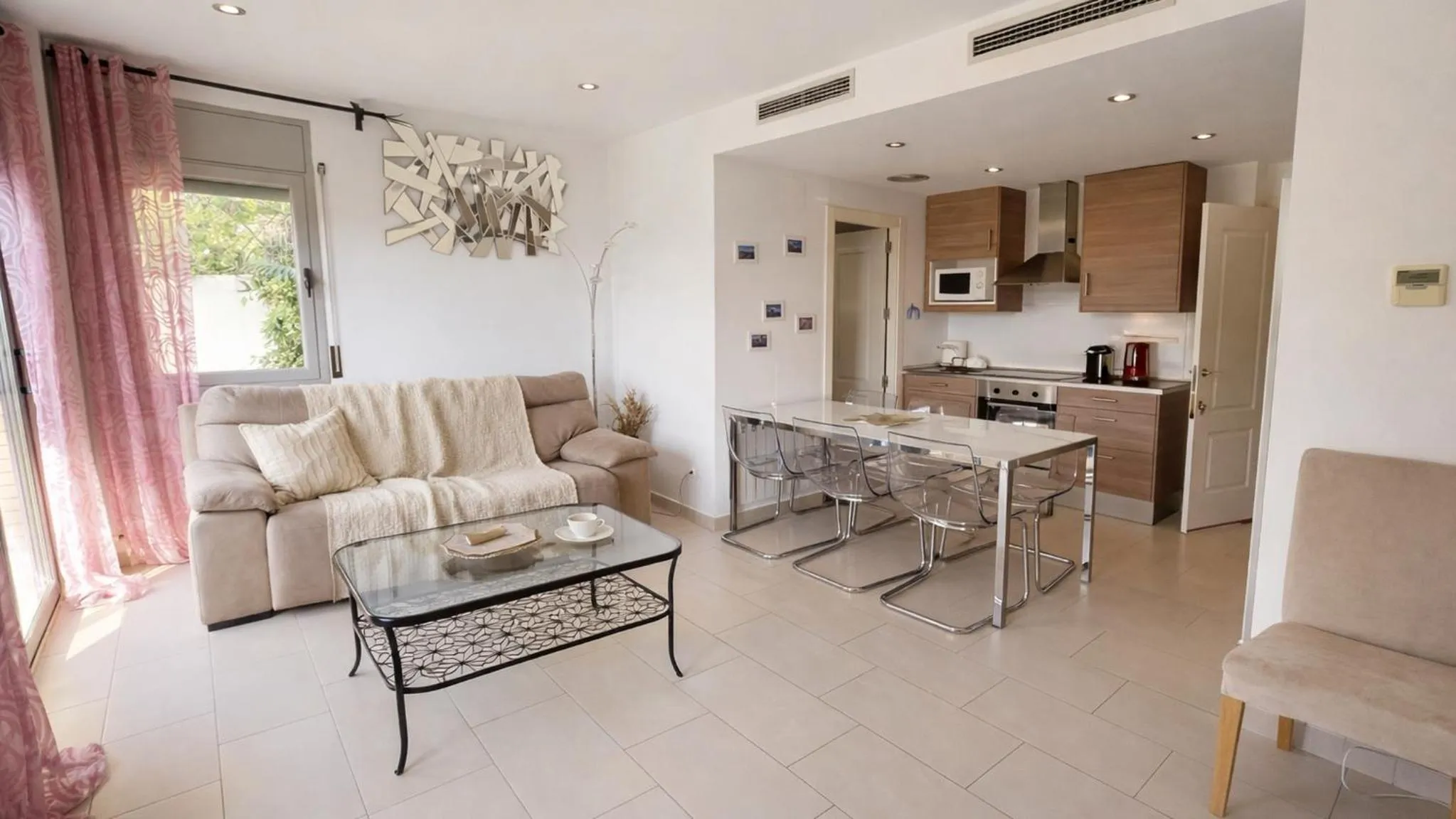 Kitchen or kitchenette in Modern Duplex in Sitges with Private Parking, Sea Views & Terrace