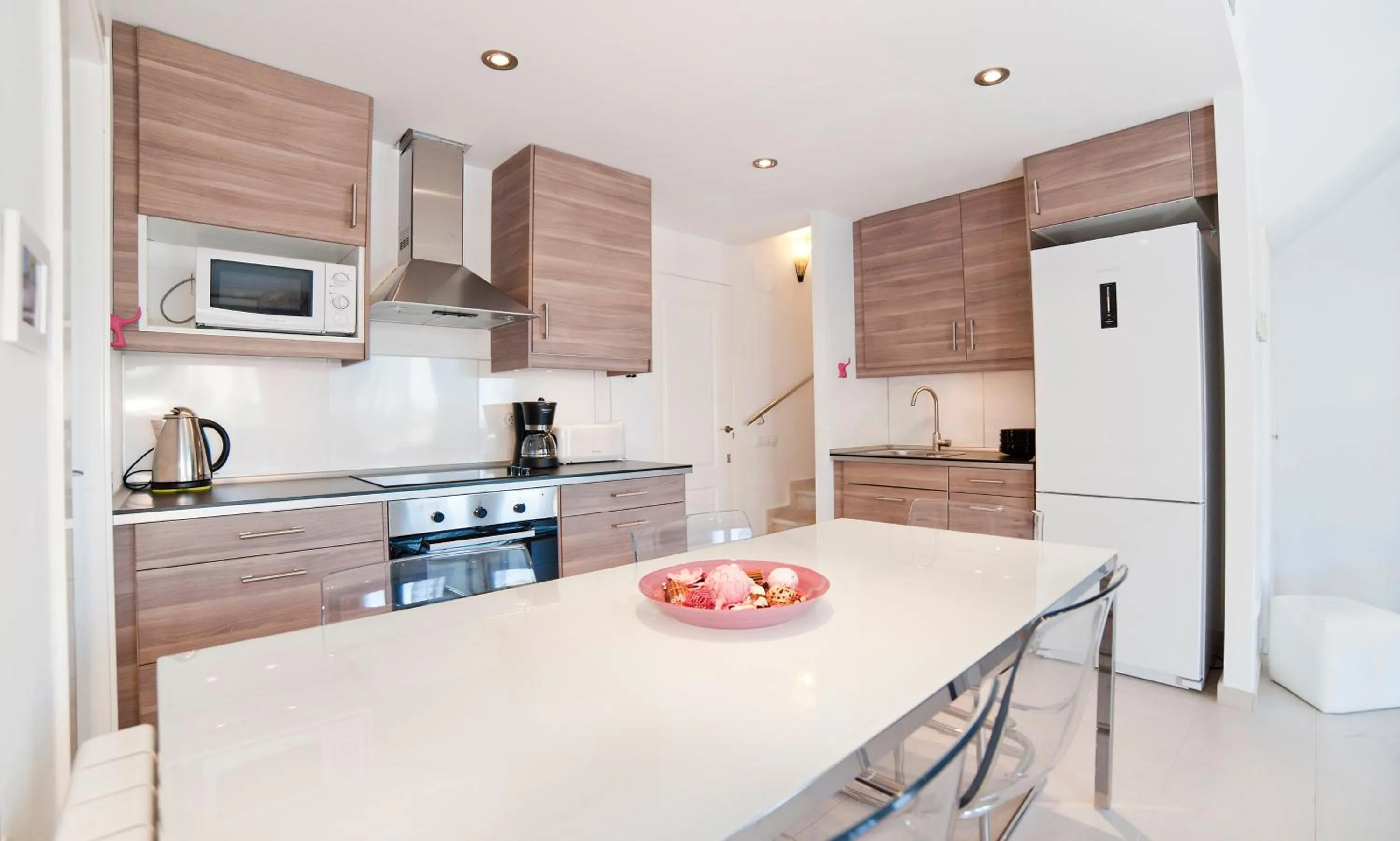 Kitchen or kitchenette in Modern Duplex in Sitges with Private Parking, Sea Views & Terrace