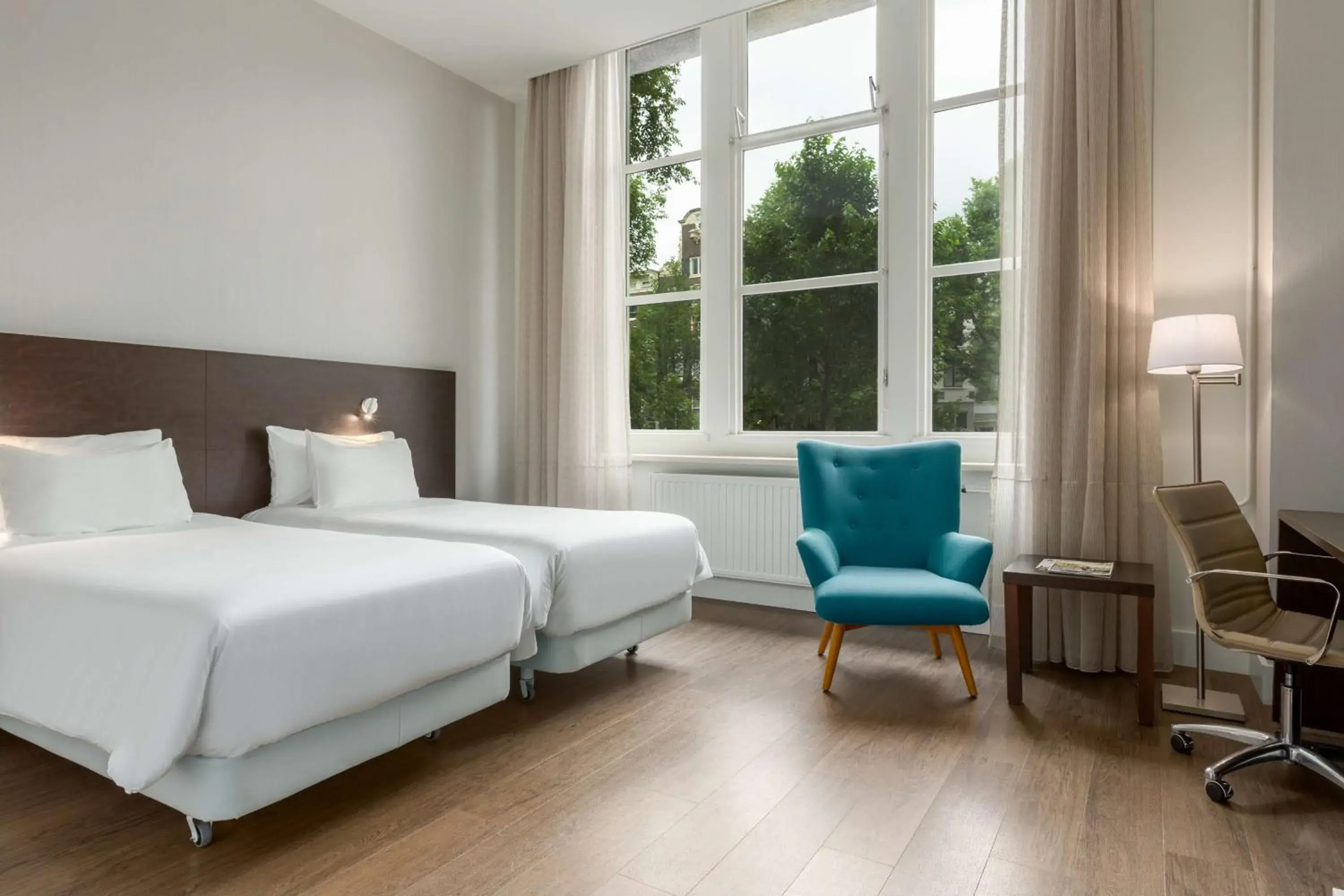 Superior Room with Canal View in NH City Centre Amsterdam Superior Room with Canal View in NH City Centre Amsterdam