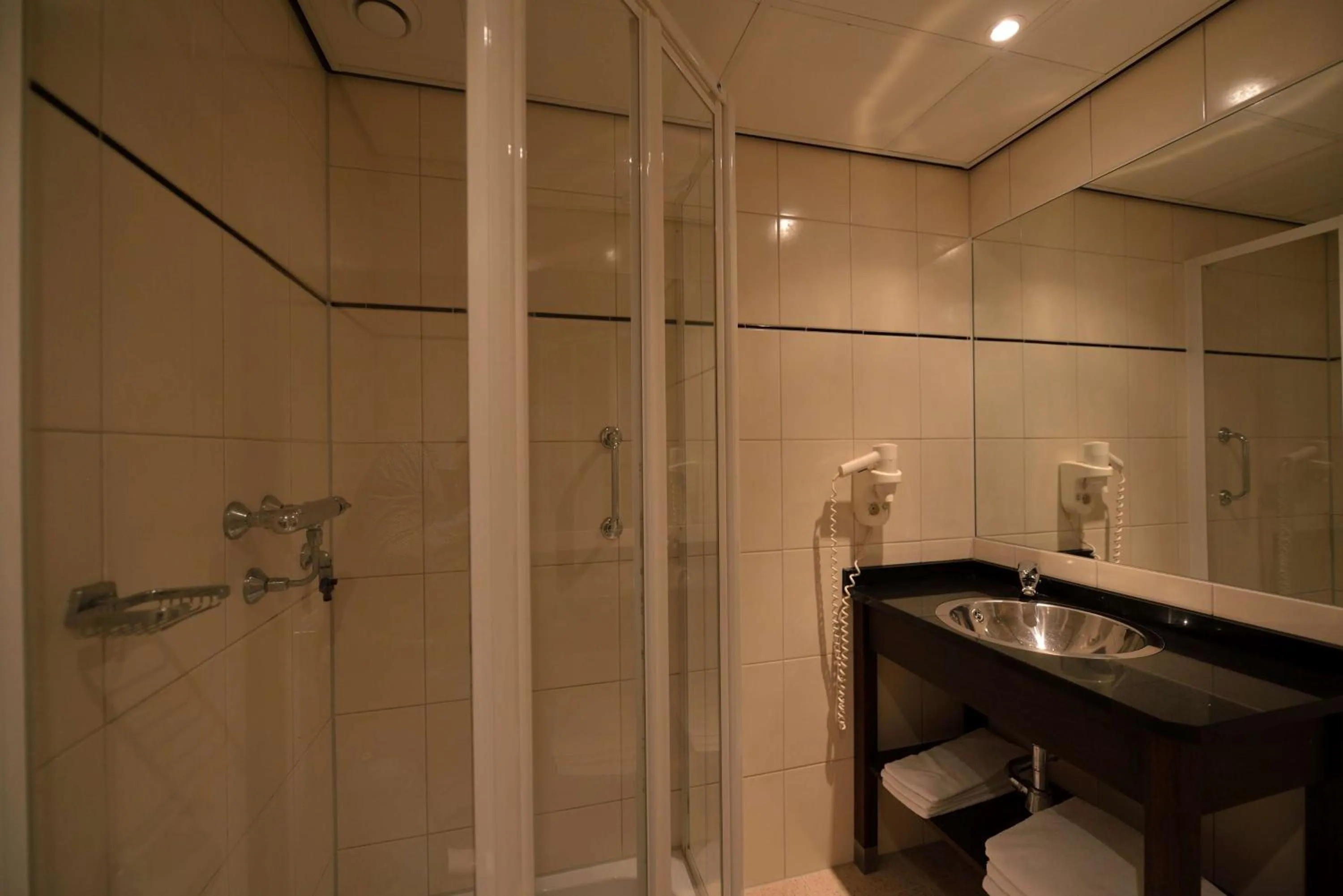 Bathroom in Best Western Dam Square Inn
