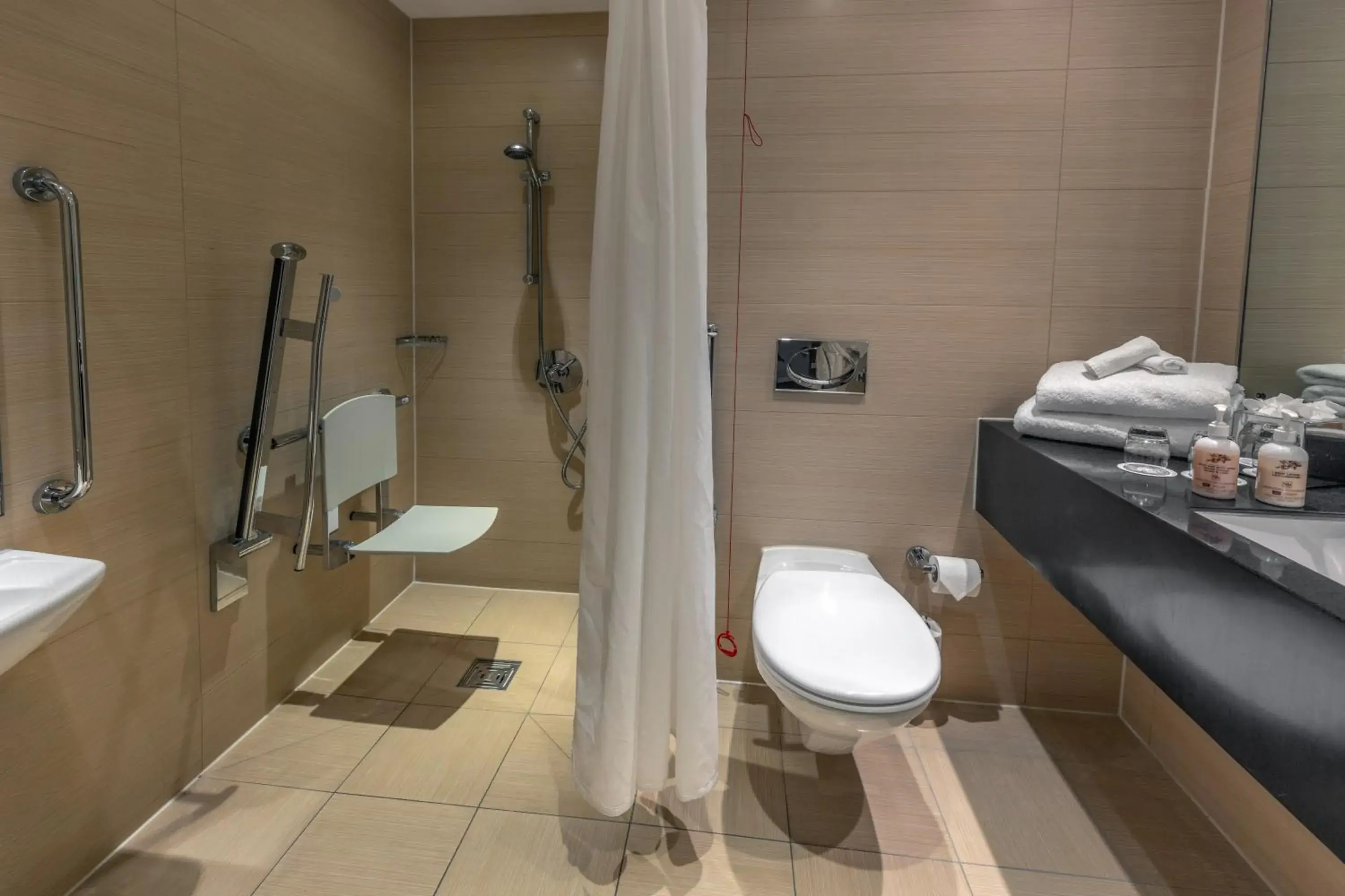 Bathroom in Cheltenham Chase Hotel & Spa Bathroom in Cheltenham Chase Hotel & Spa