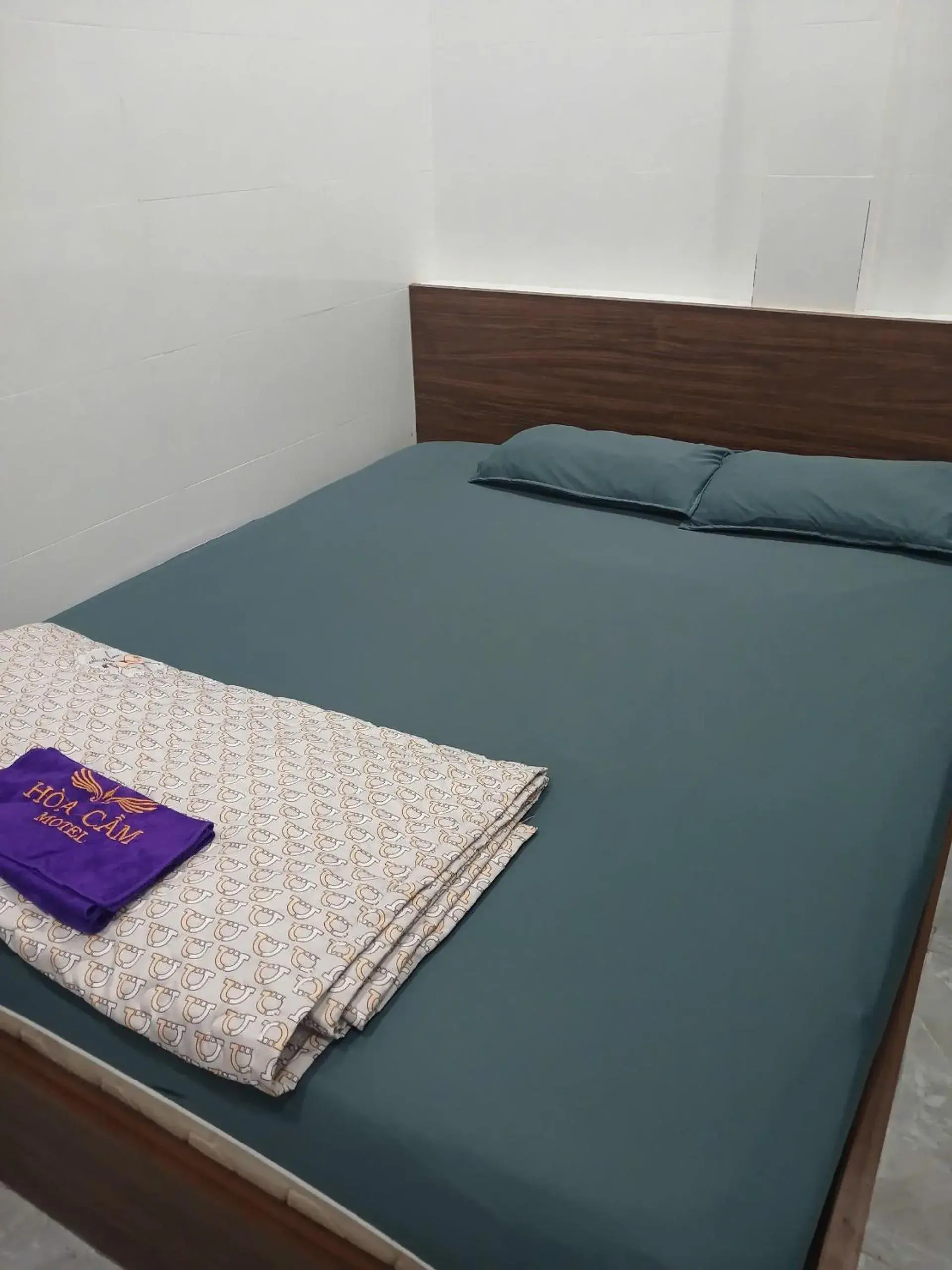 Bed in SPOT ON 1188 Motel Hoa Cam Bed in SPOT ON 1188 Motel Hoa Cam