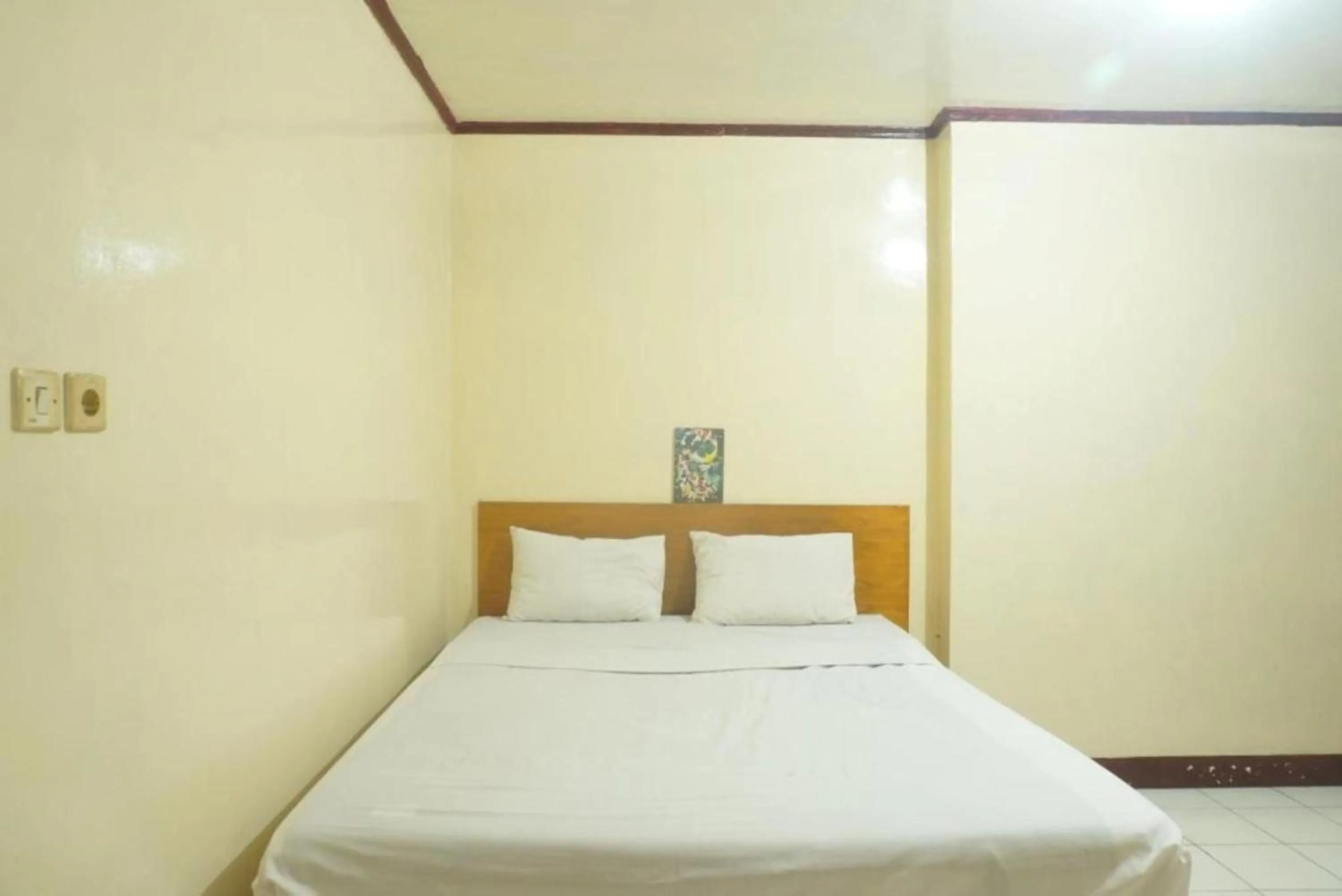 Photo of the whole room, Bed in Hotel O Rumah Massagena Syariah Near Gedung Olahraga Enrekang