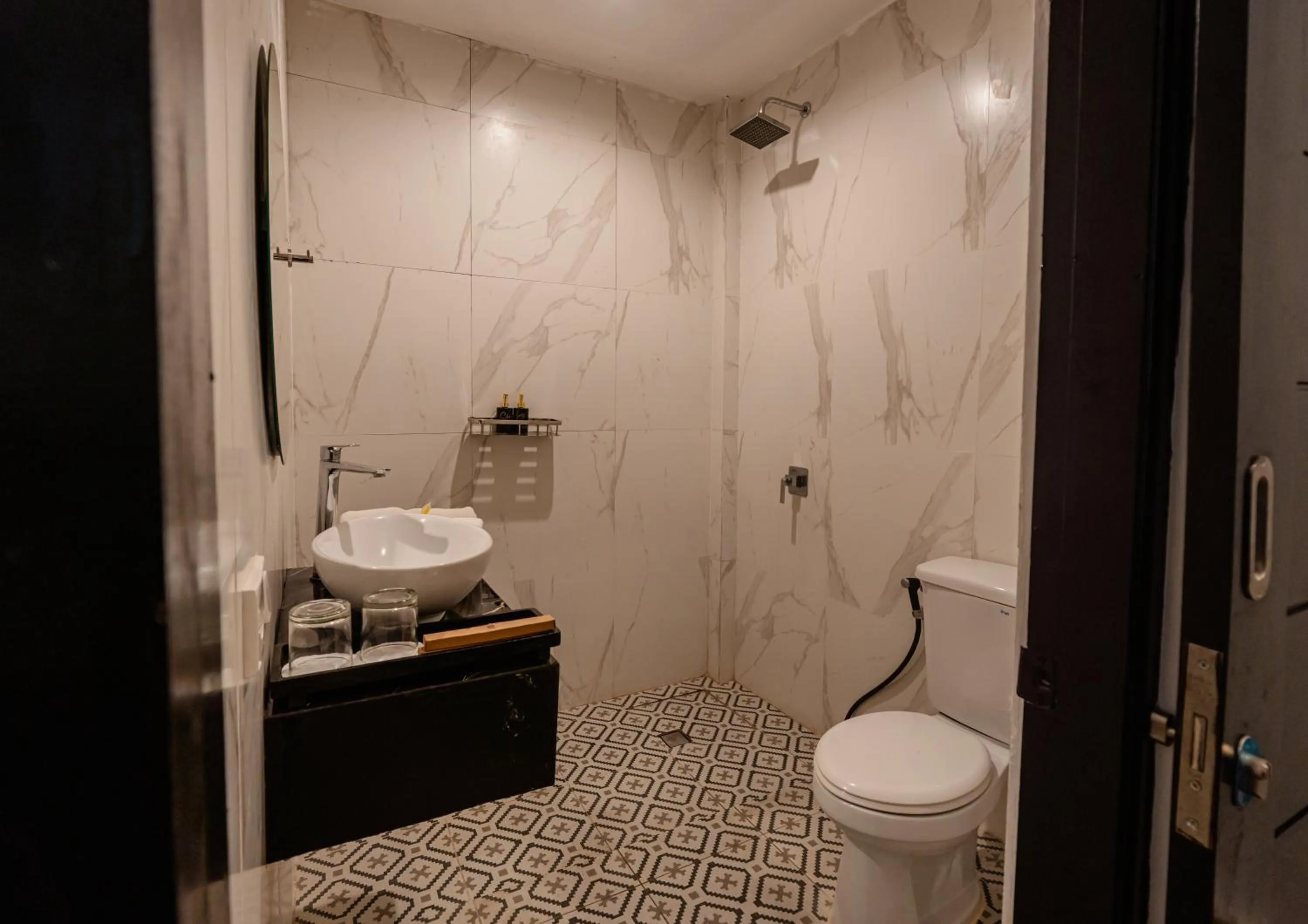 Bathroom in Casa Wina Kuta Managed by ARM Hospitality