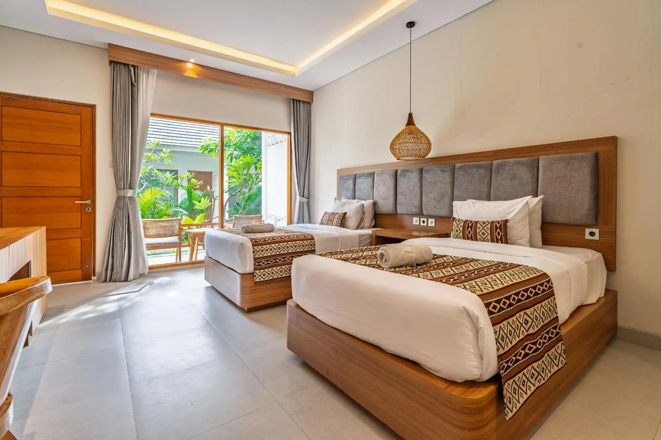 Bed in Casa Wina Kuta by The Wina Resorts Bed in Casa Wina Kuta by The Wina Resorts