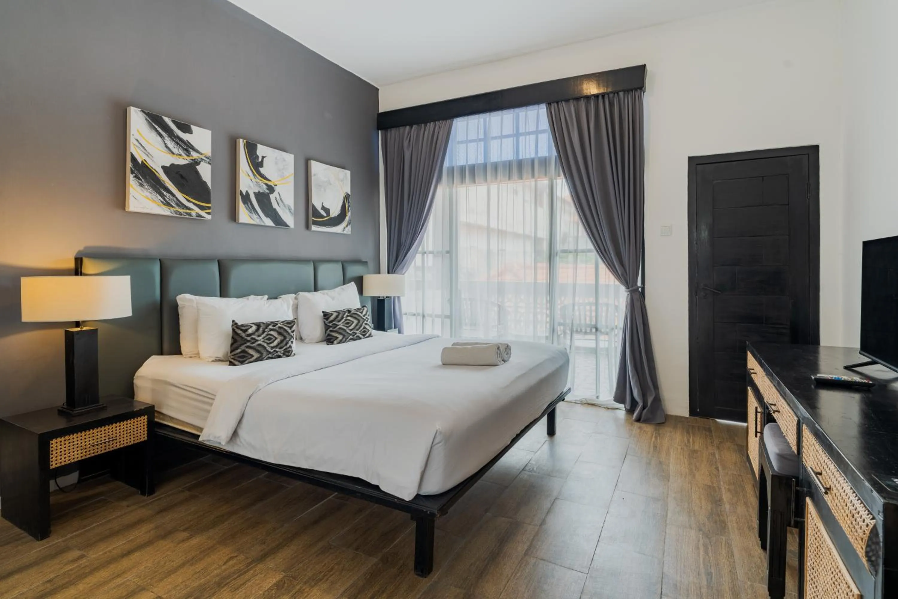 Bed in Casa Wina Kuta by The Wina Resorts