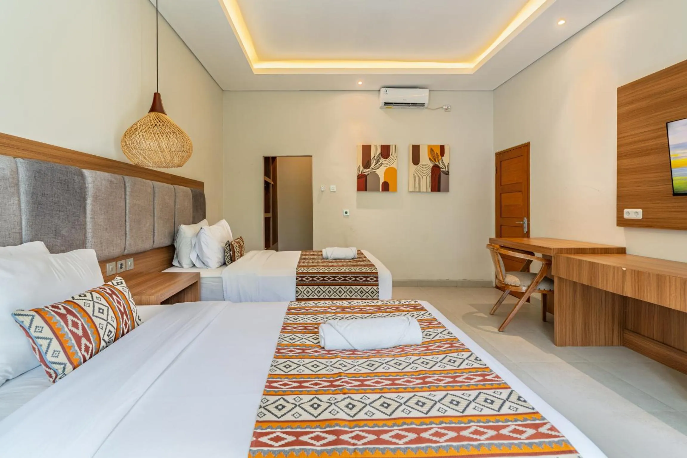 Bed in Casa Wina Kuta by The Wina Resorts