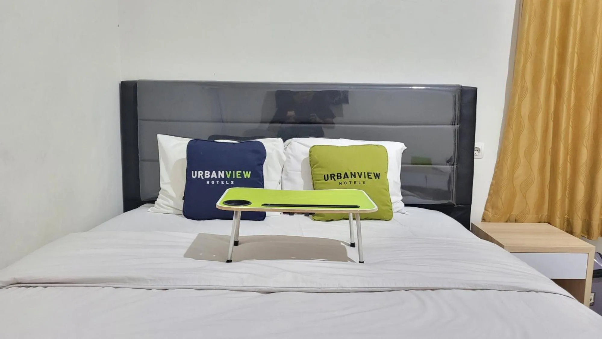 Bed in Urbanview Le Reno Inn Wirobrajan by RedDoorz