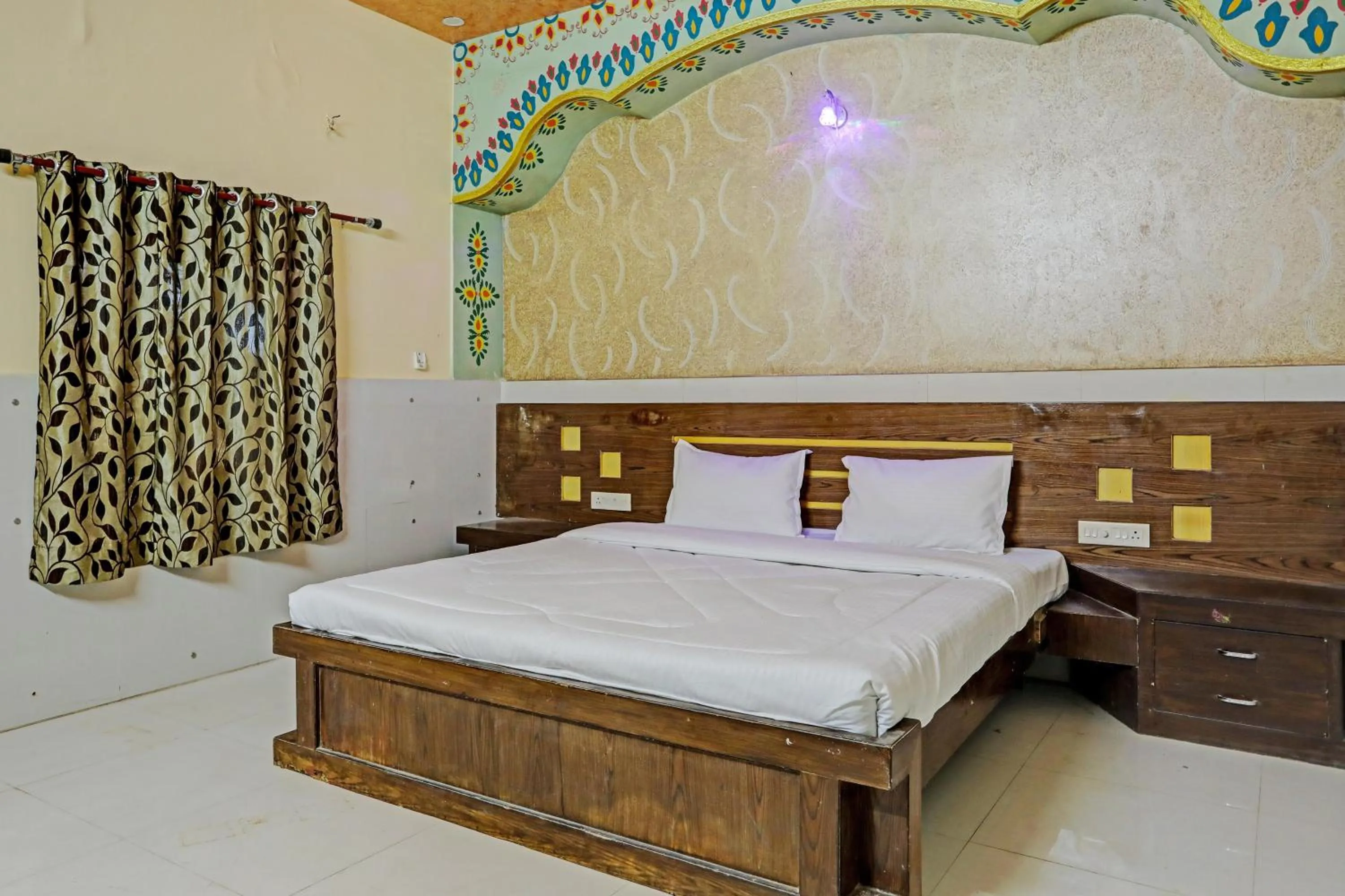 Bedroom in Collection O MG Hotel & Resturant