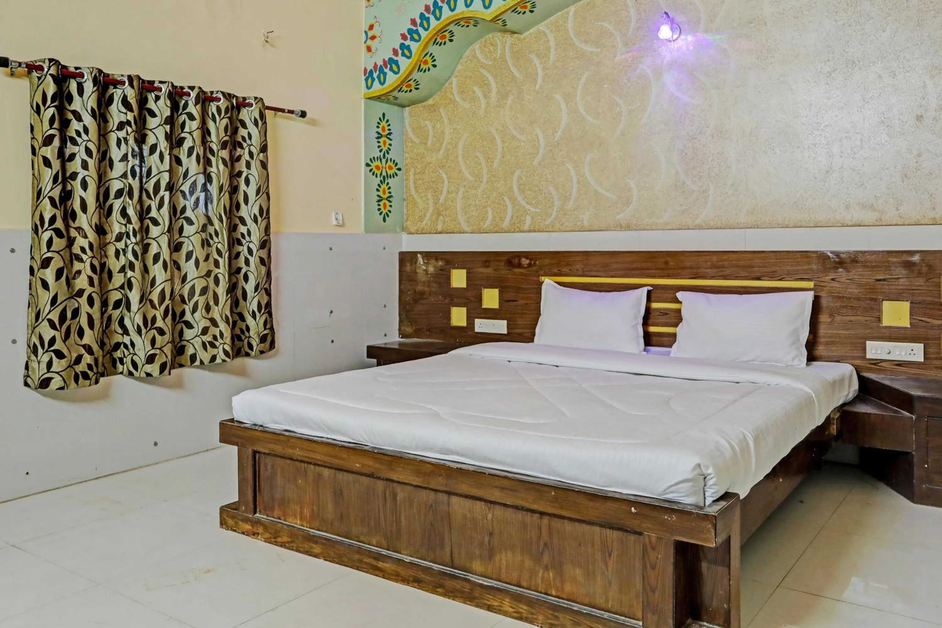 Bedroom in Collection O MG Hotel & Resturant