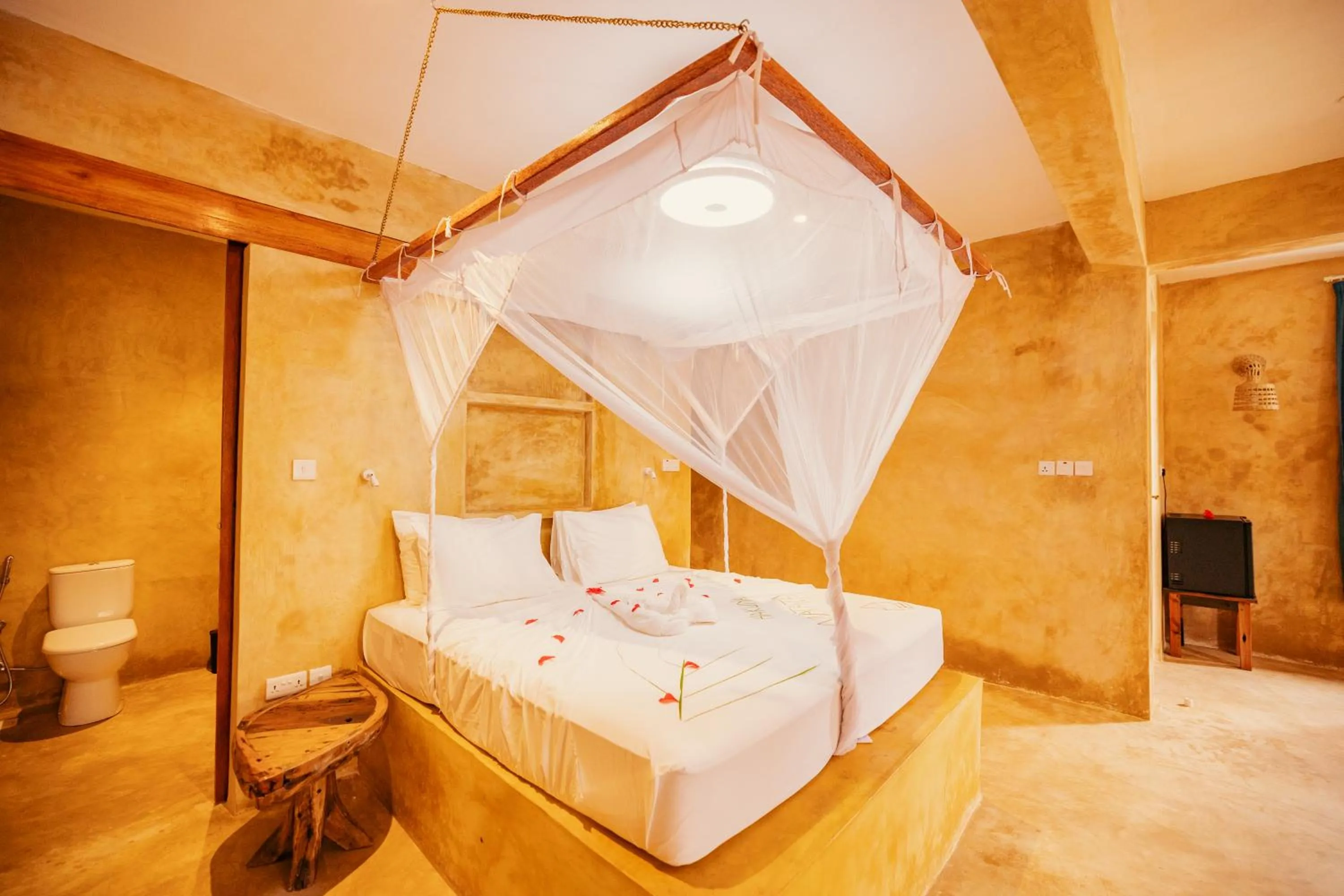 Bed in Mayai Ocean Resort