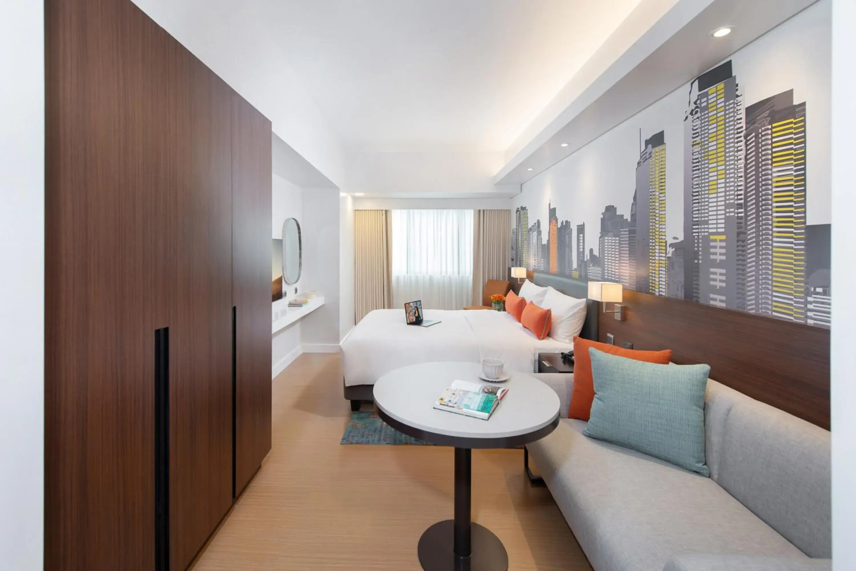 Seating area, Bed in Citadines Benavidez Makati Seating area, Bed in Citadines Benavidez Makati