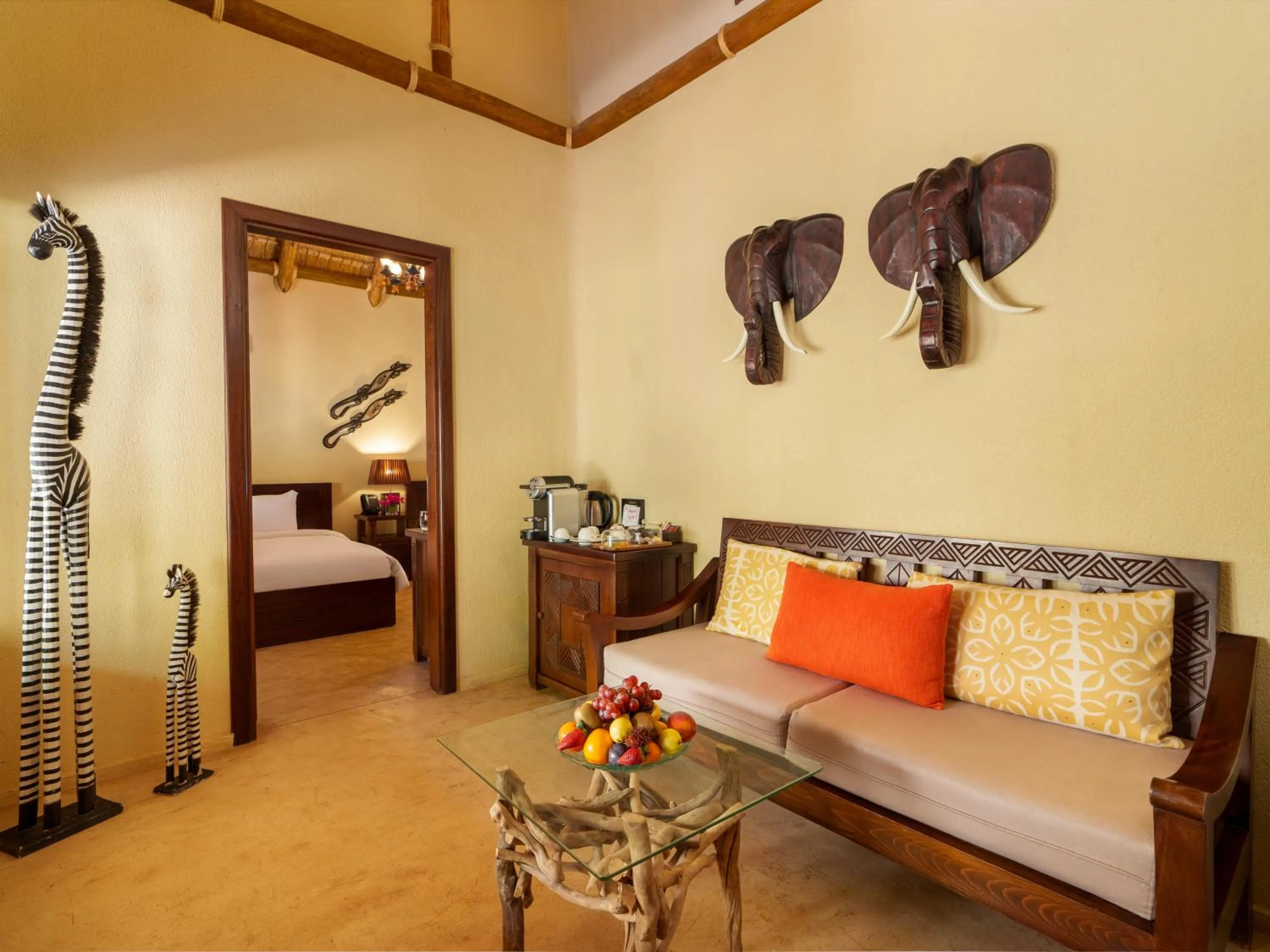 Seating area, Bed in Nofa Riyadh, A Radisson Collection Resort