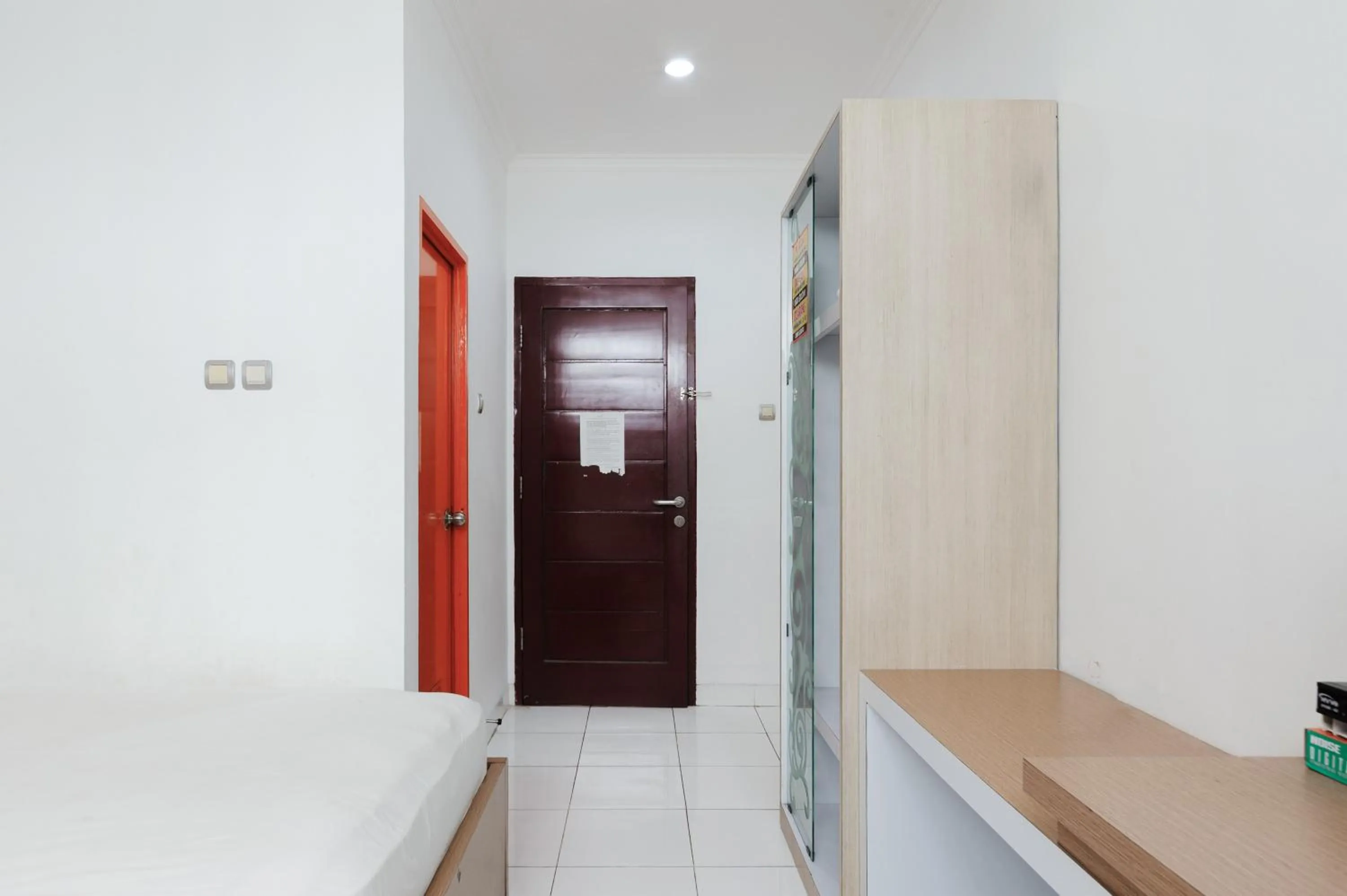 Bedroom in Urbanview Hotel Niraz Banjarmasin by RedDoorz