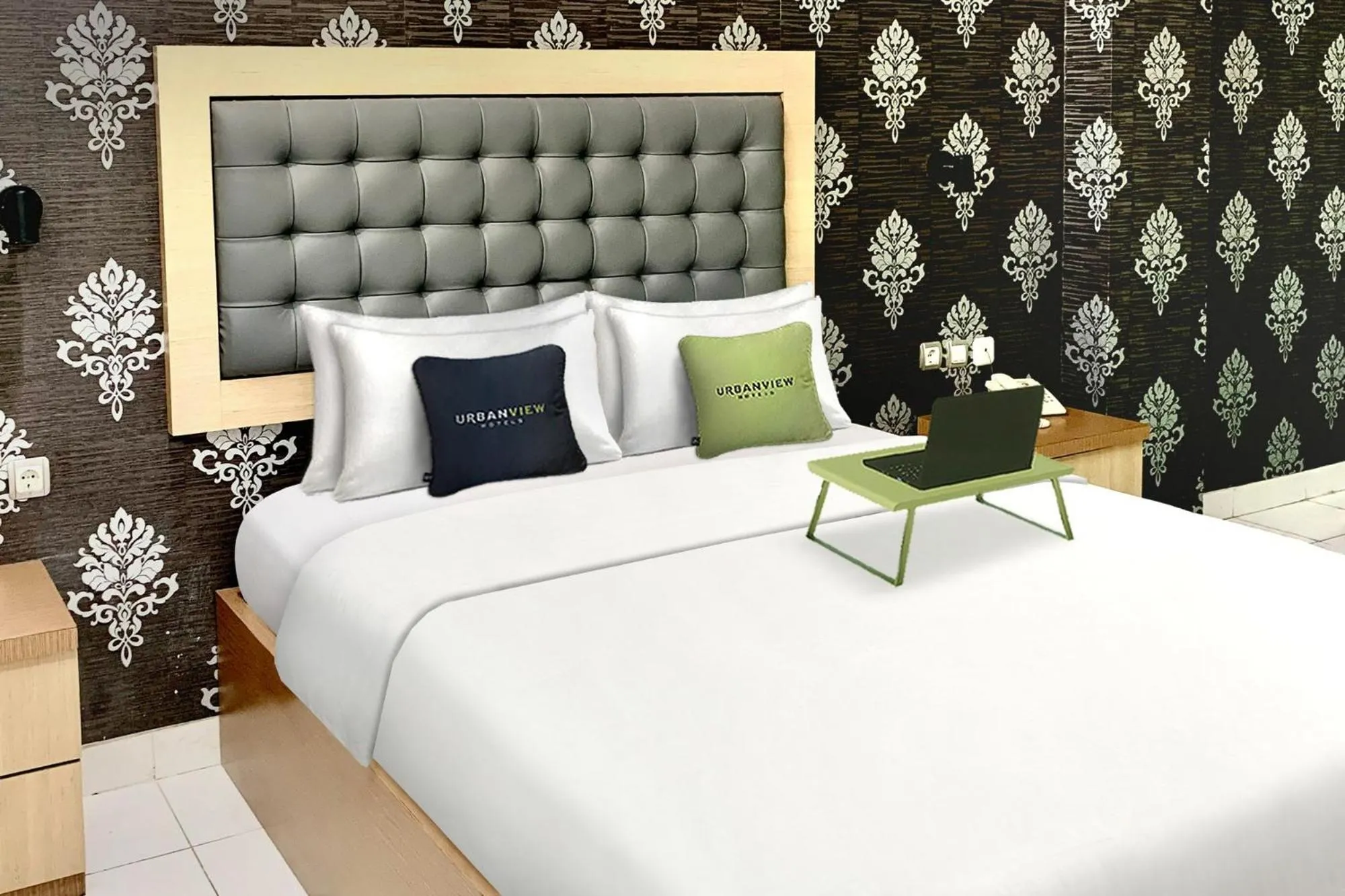 Bed in Urbanview Hotel Niraz Syariah Banjarmasin by RedDoorz