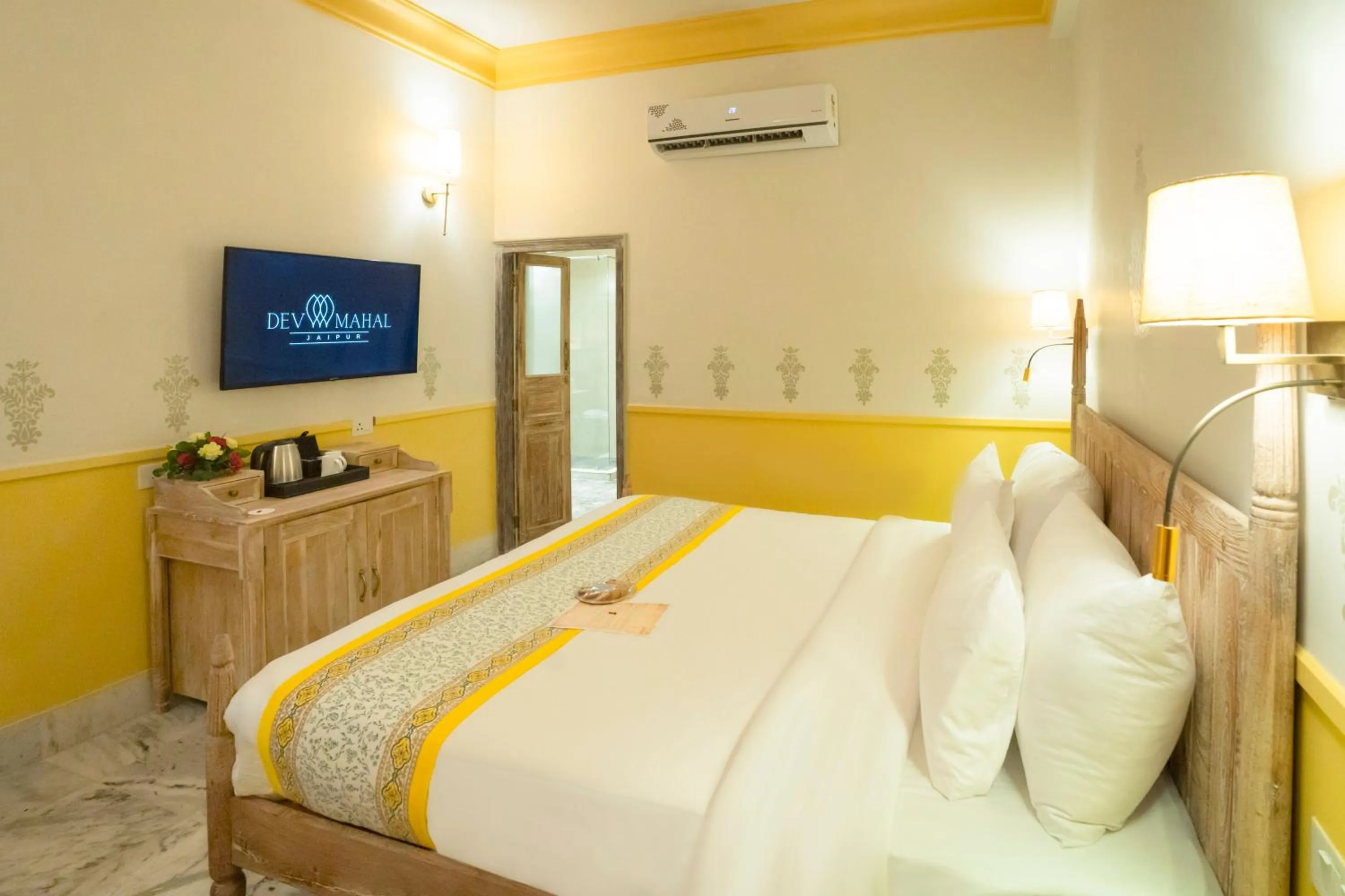 TV and multimedia, Bed in Dev Mahal - A Boutique Heritage Hotel