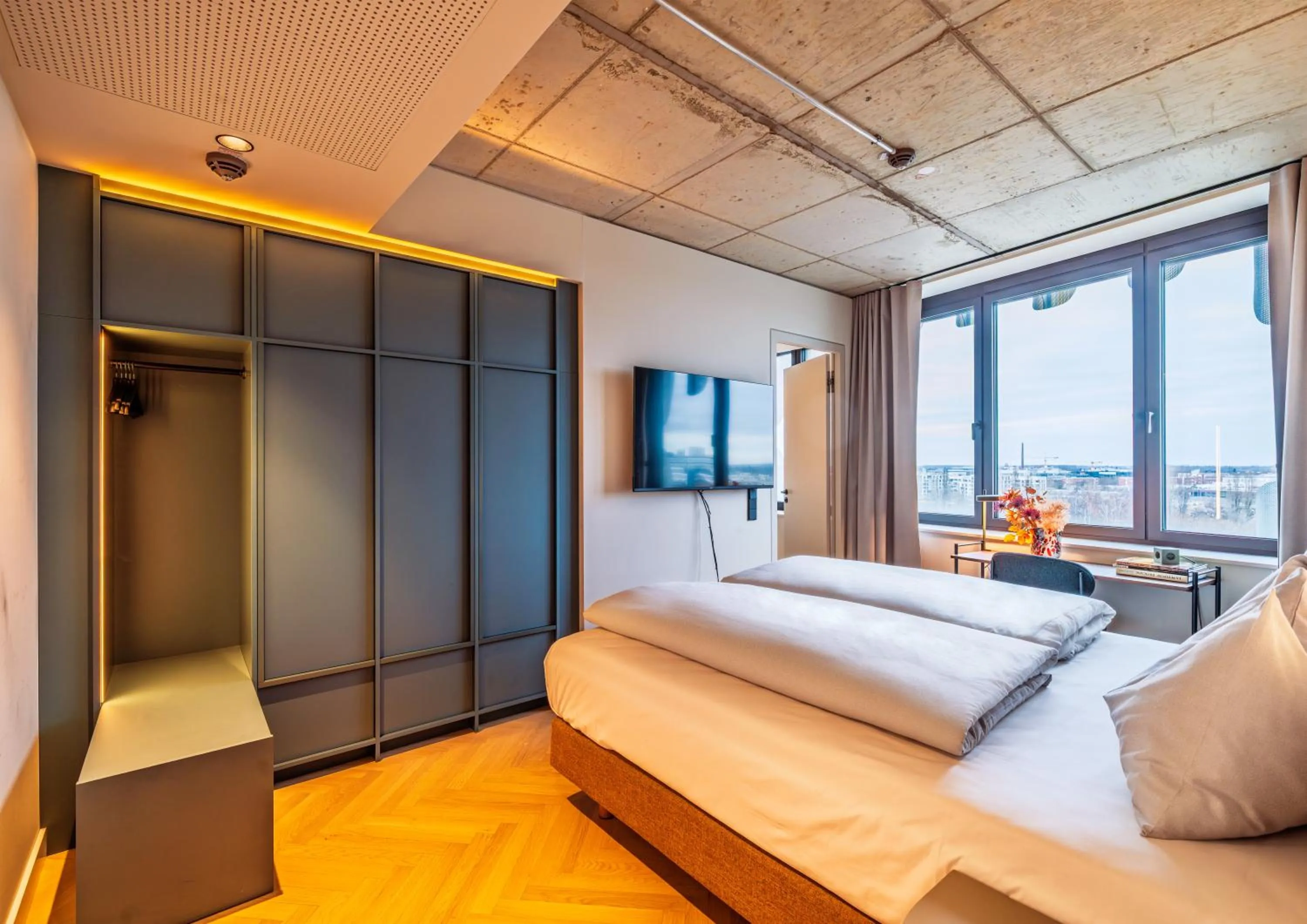 Bed in The Zipper Hotel und Apartments