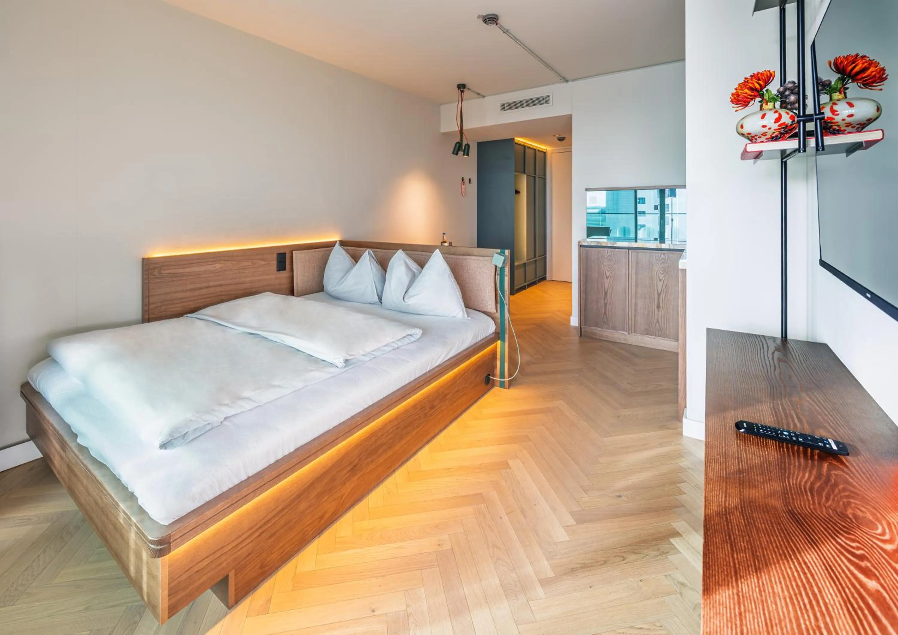 Bed in The Zipper Hotel und Apartments