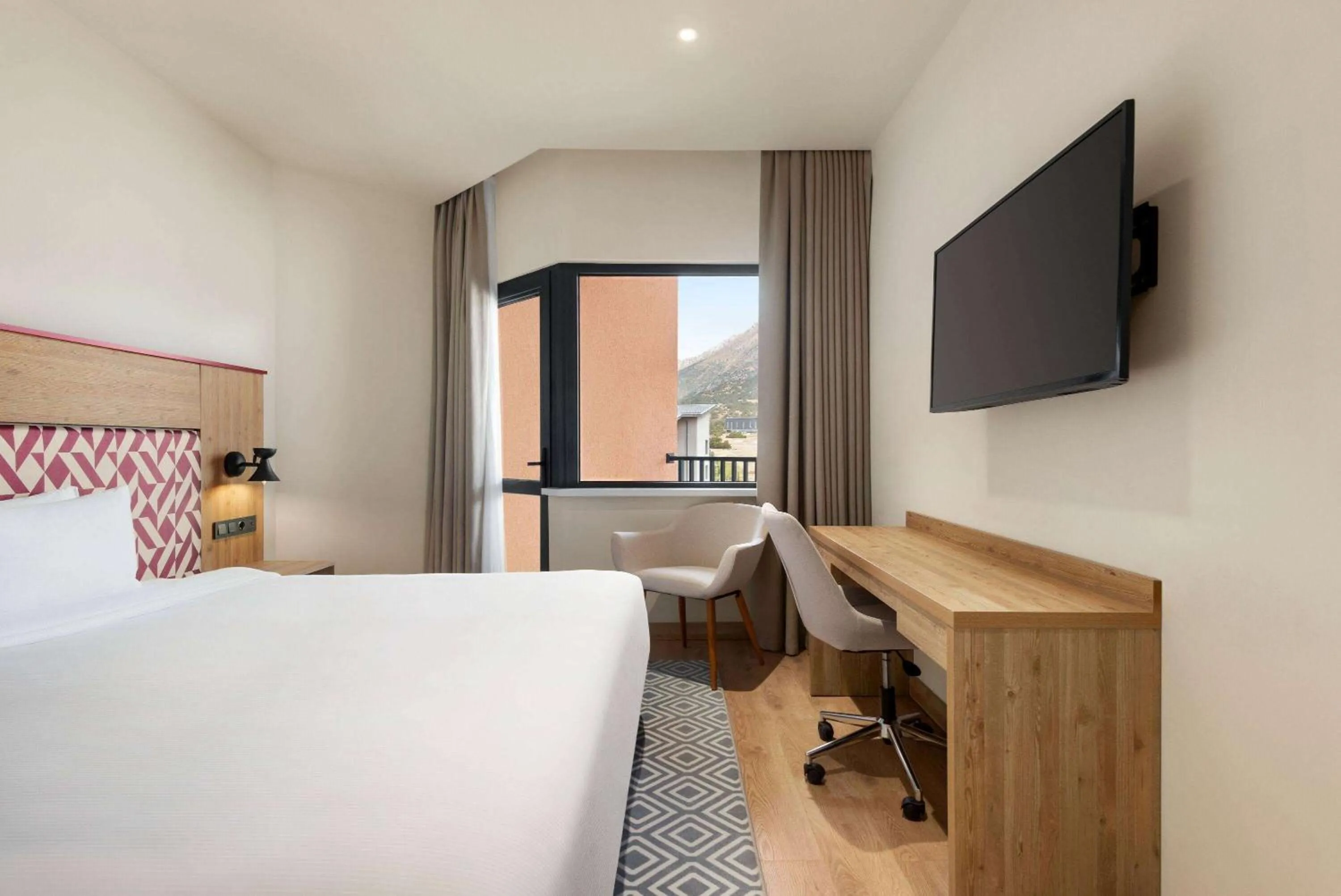 Photo of the whole room in Ramada Encore by Wyndham Zomin