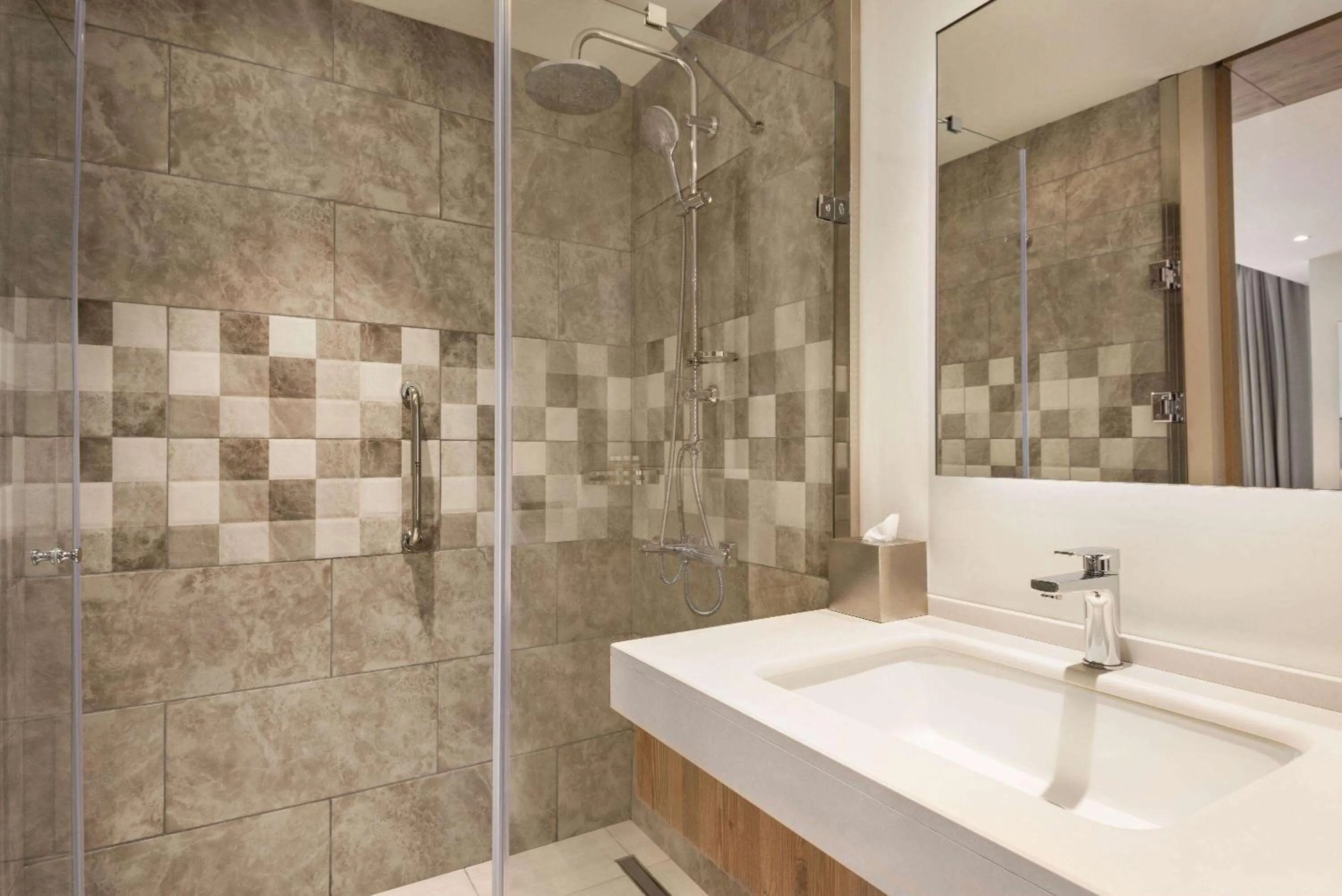 TV and multimedia in Ramada Encore by Wyndham Zomin