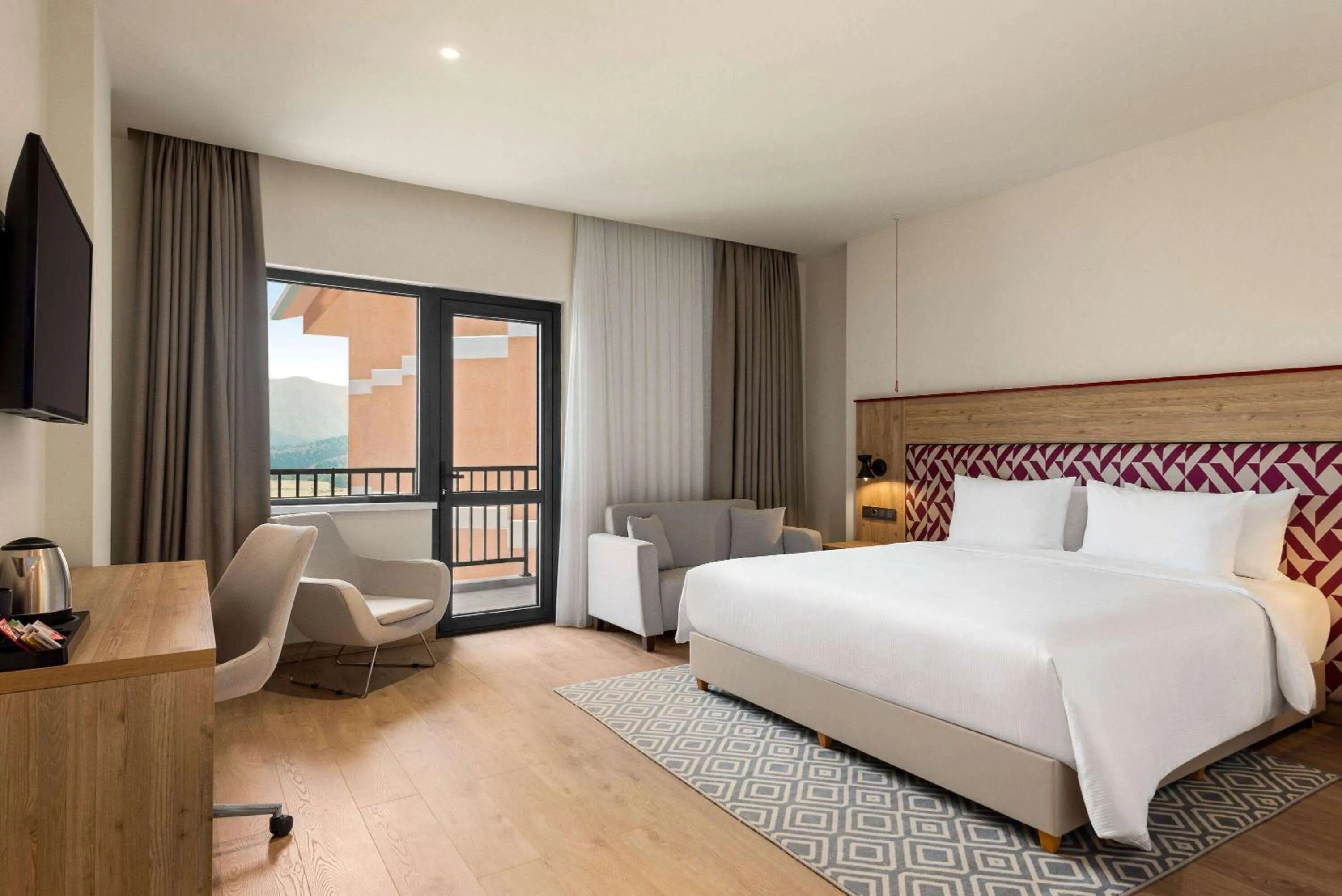 Photo of the whole room in Ramada Encore by Wyndham Zomin