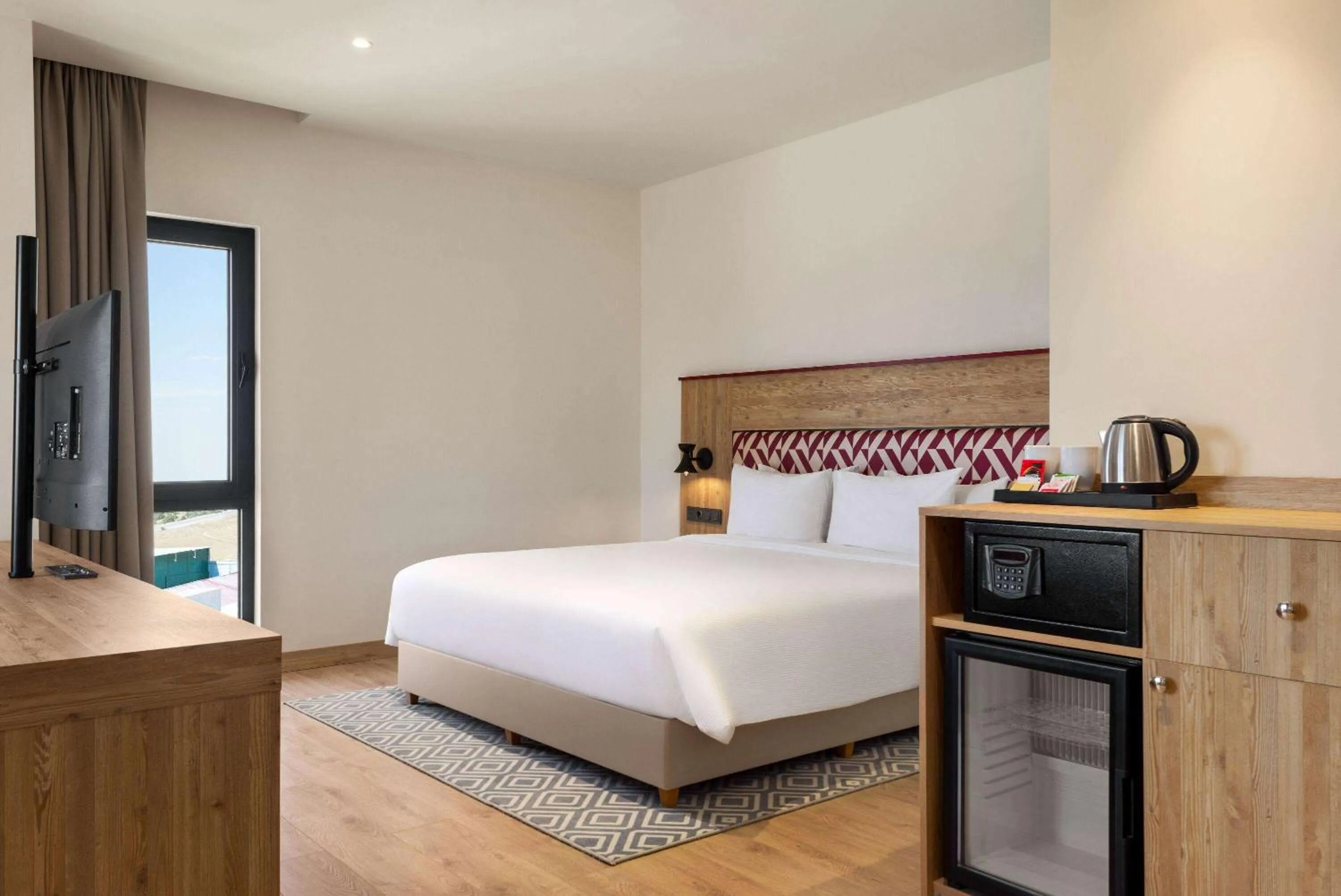 Photo of the whole room in Ramada Encore by Wyndham Zomin