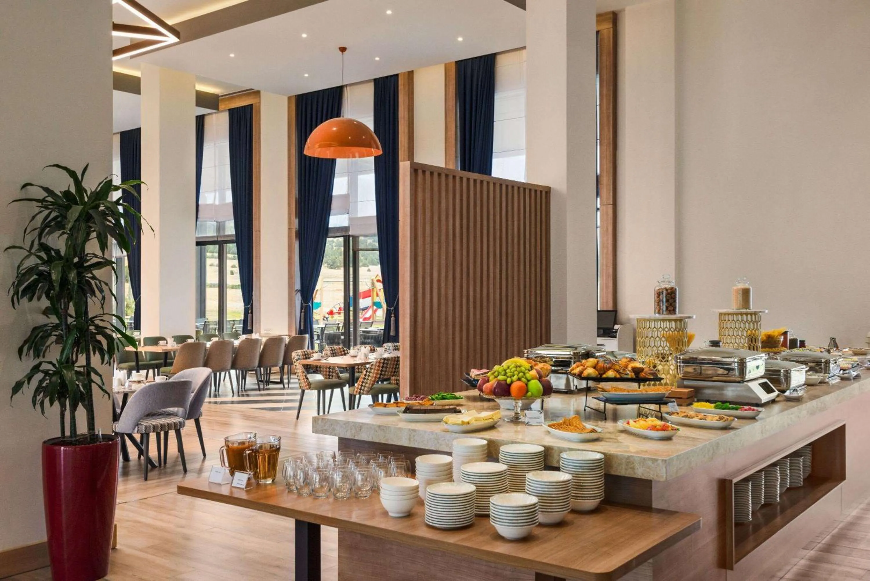 Breakfast in Ramada Encore by Wyndham Zomin