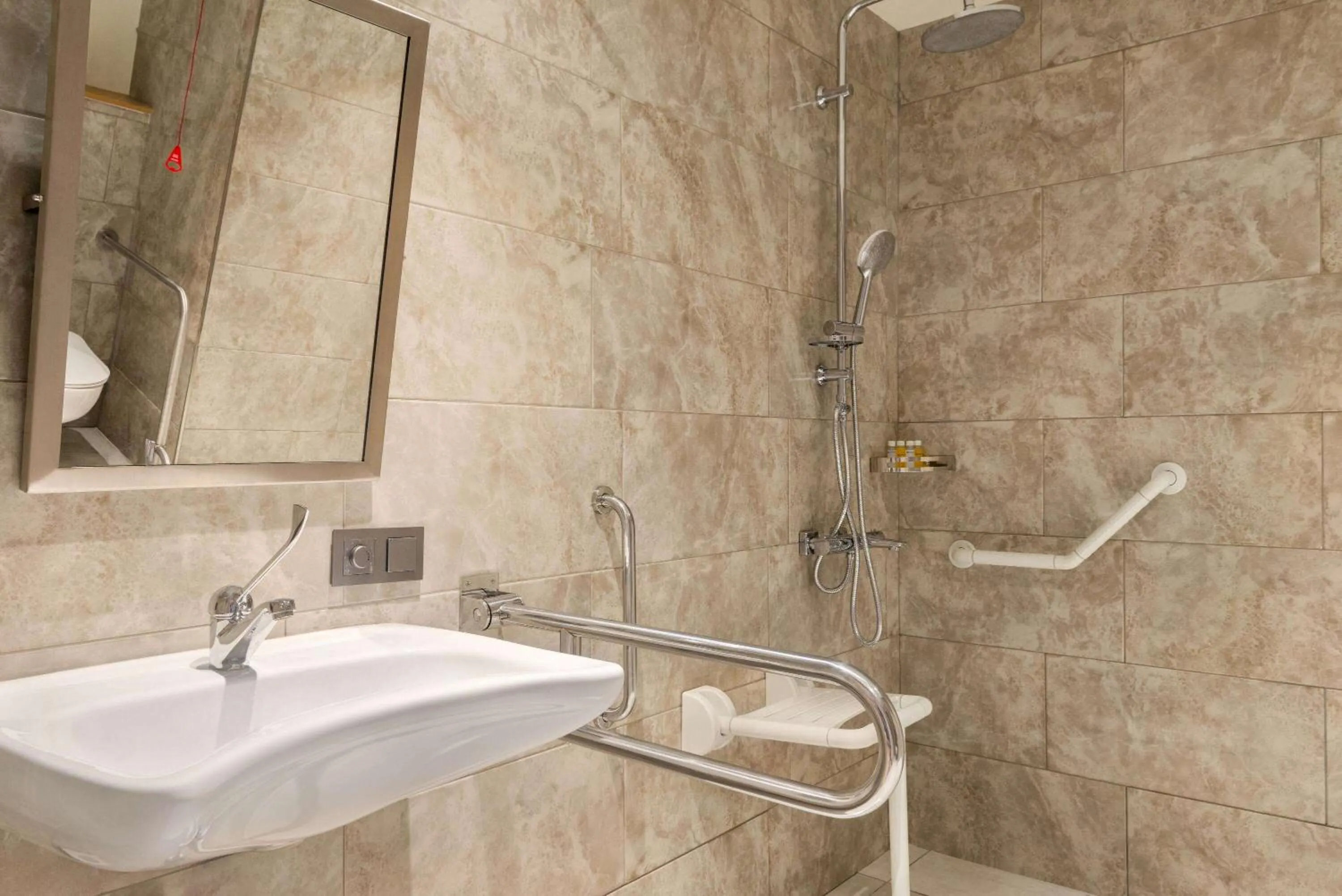Shower in Ramada Encore by Wyndham Zomin