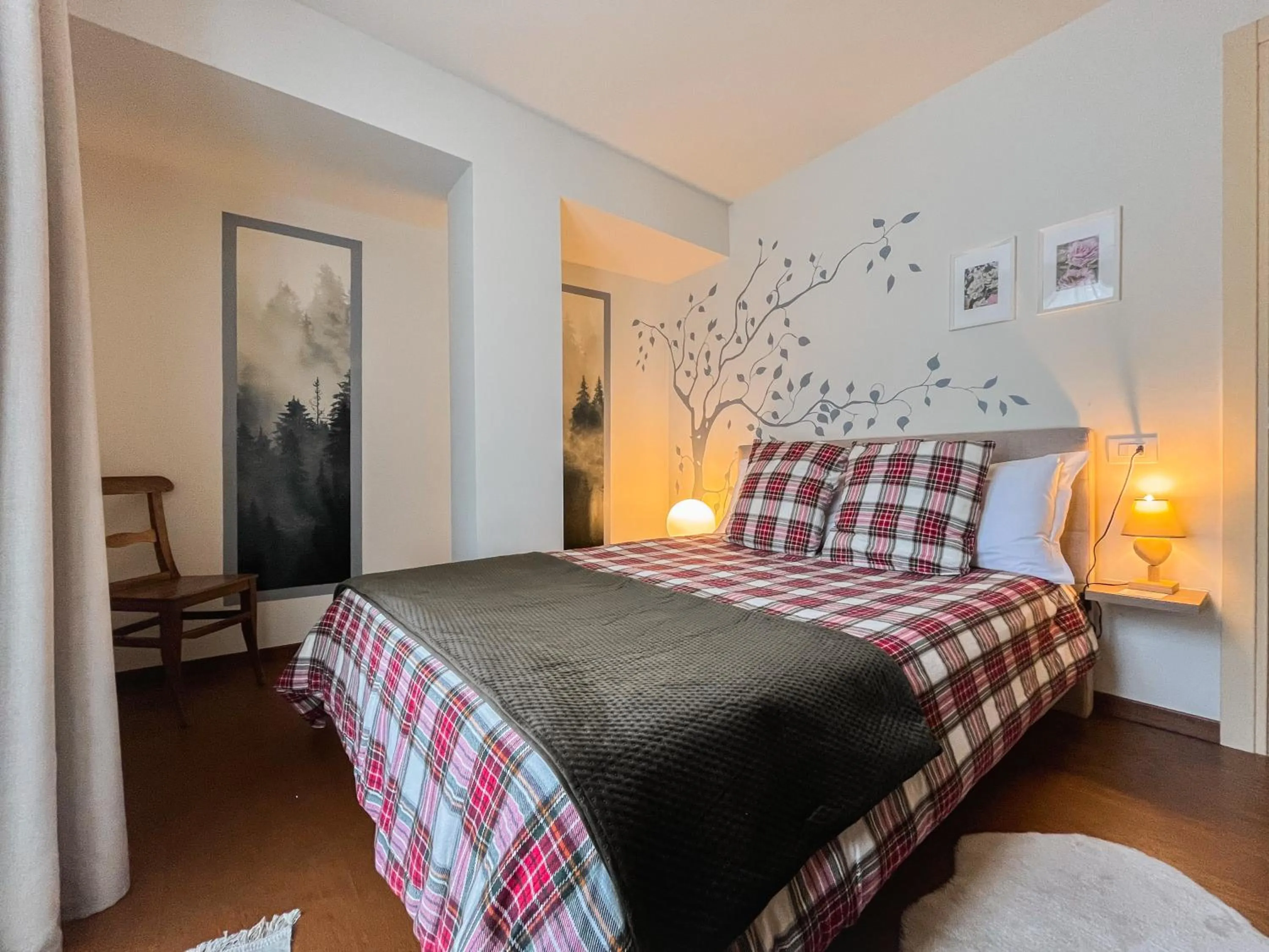 Bedroom in Maison Poluc hotel apartments