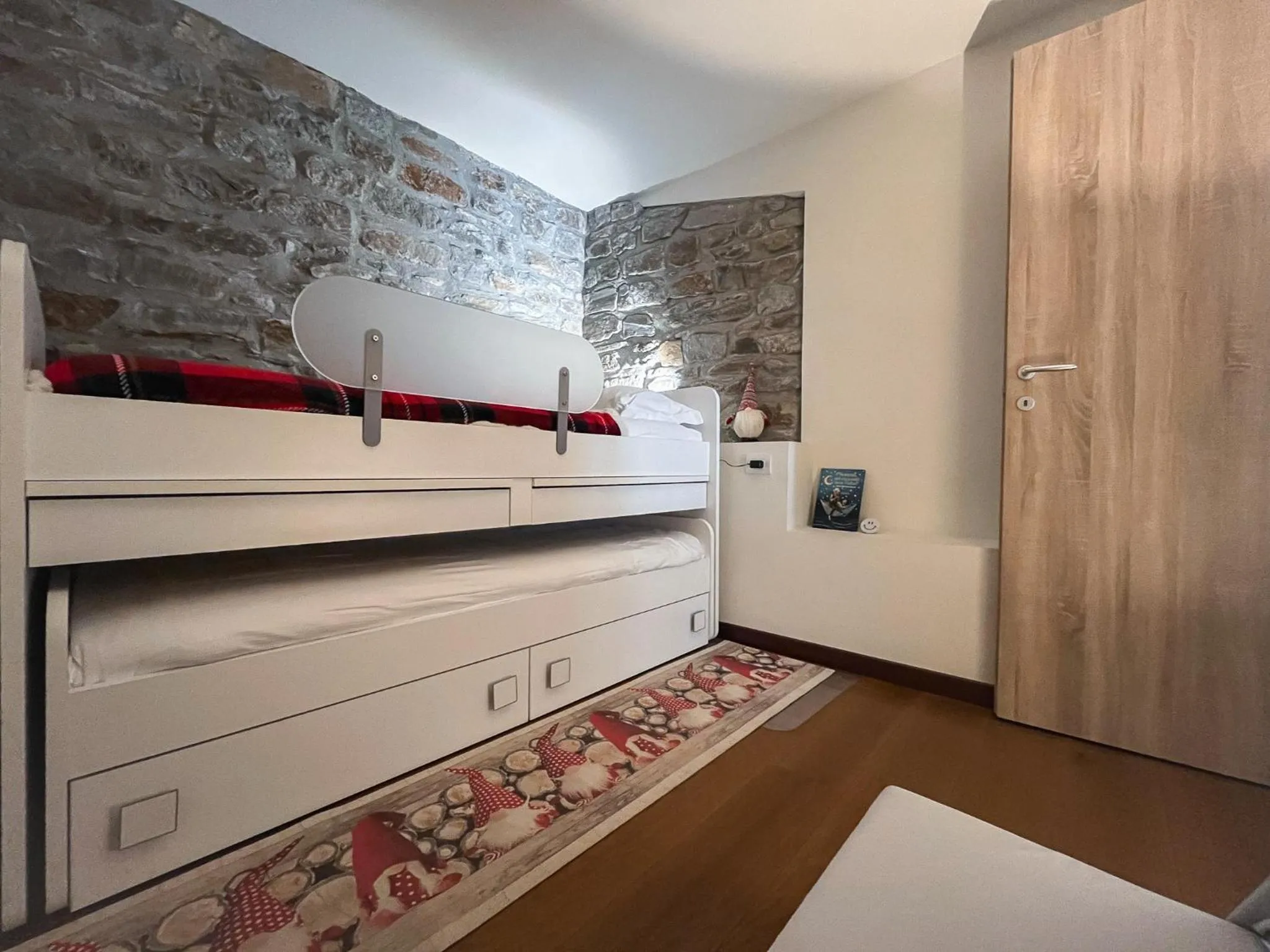 Bed in Maison Poluc hotel apartments