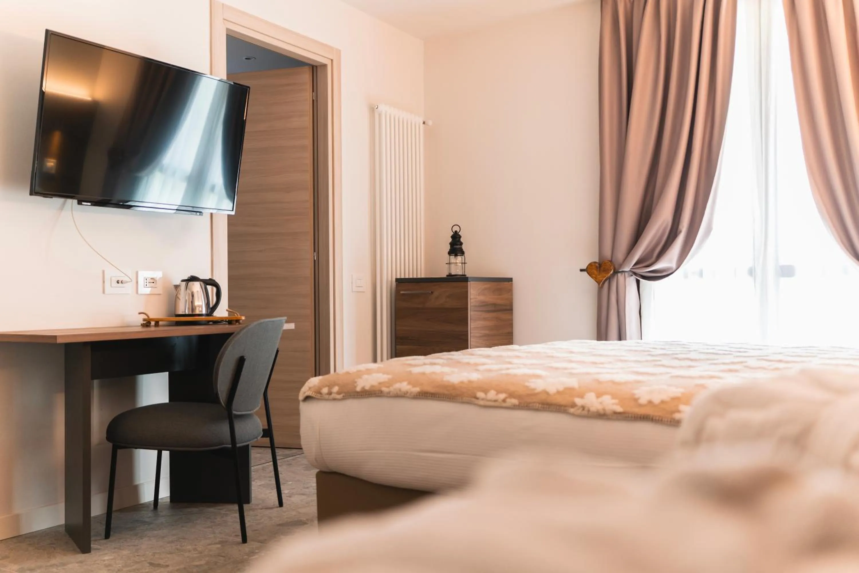 Bedroom in Maison Poluc hotel apartments