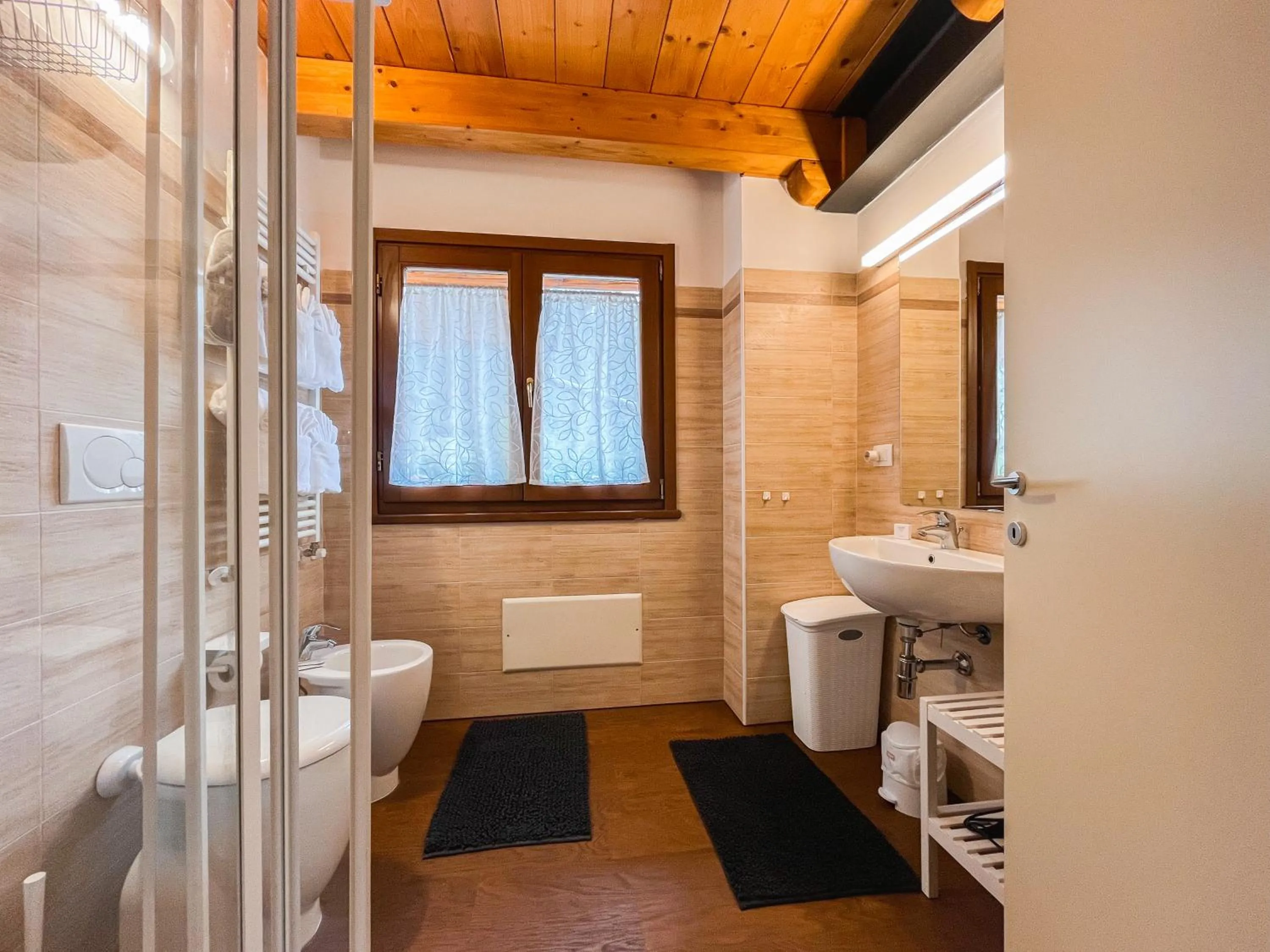 Bathroom in Maison Poluc hotel apartments