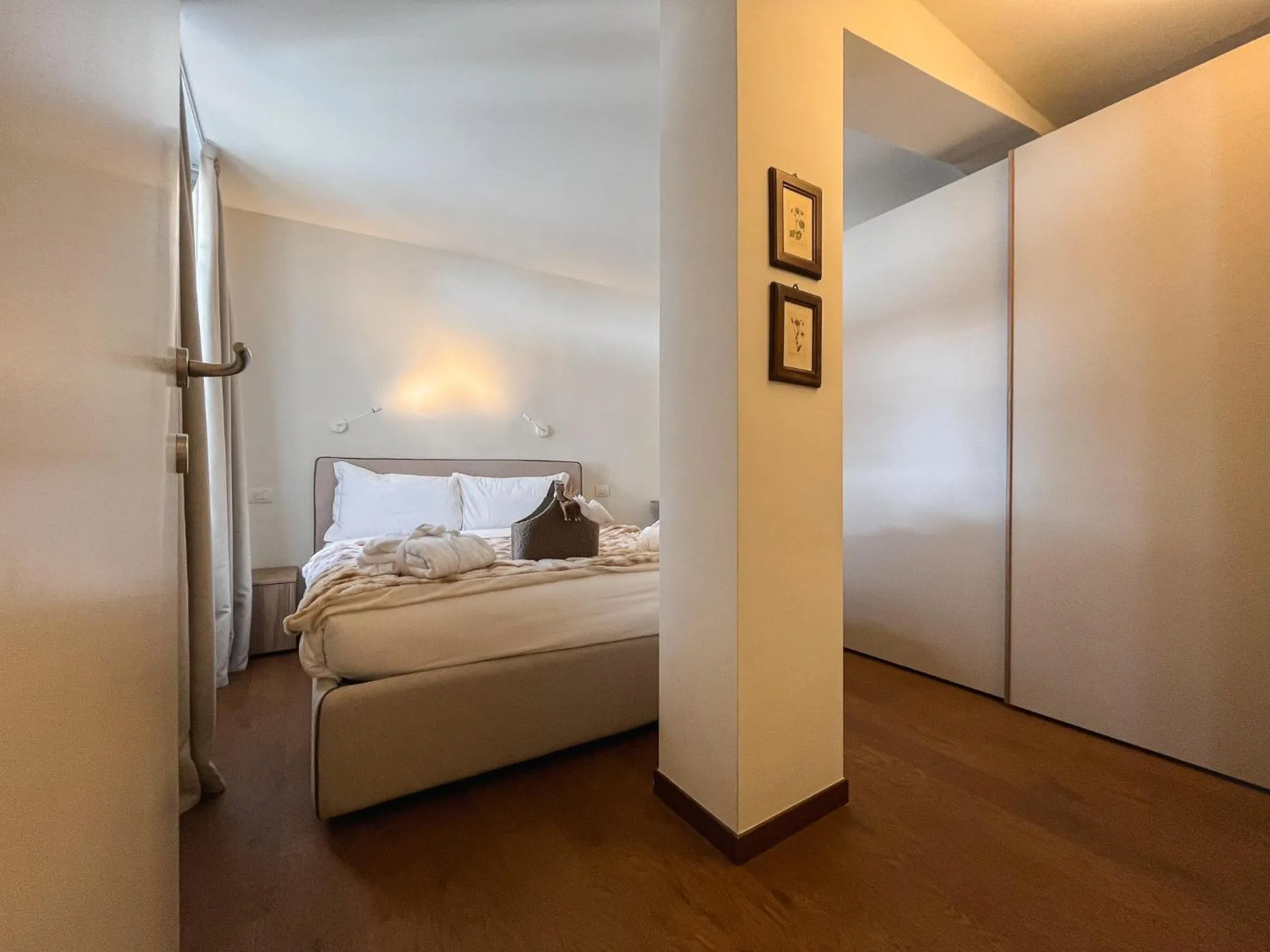 Bedroom in Maison Poluc hotel apartments