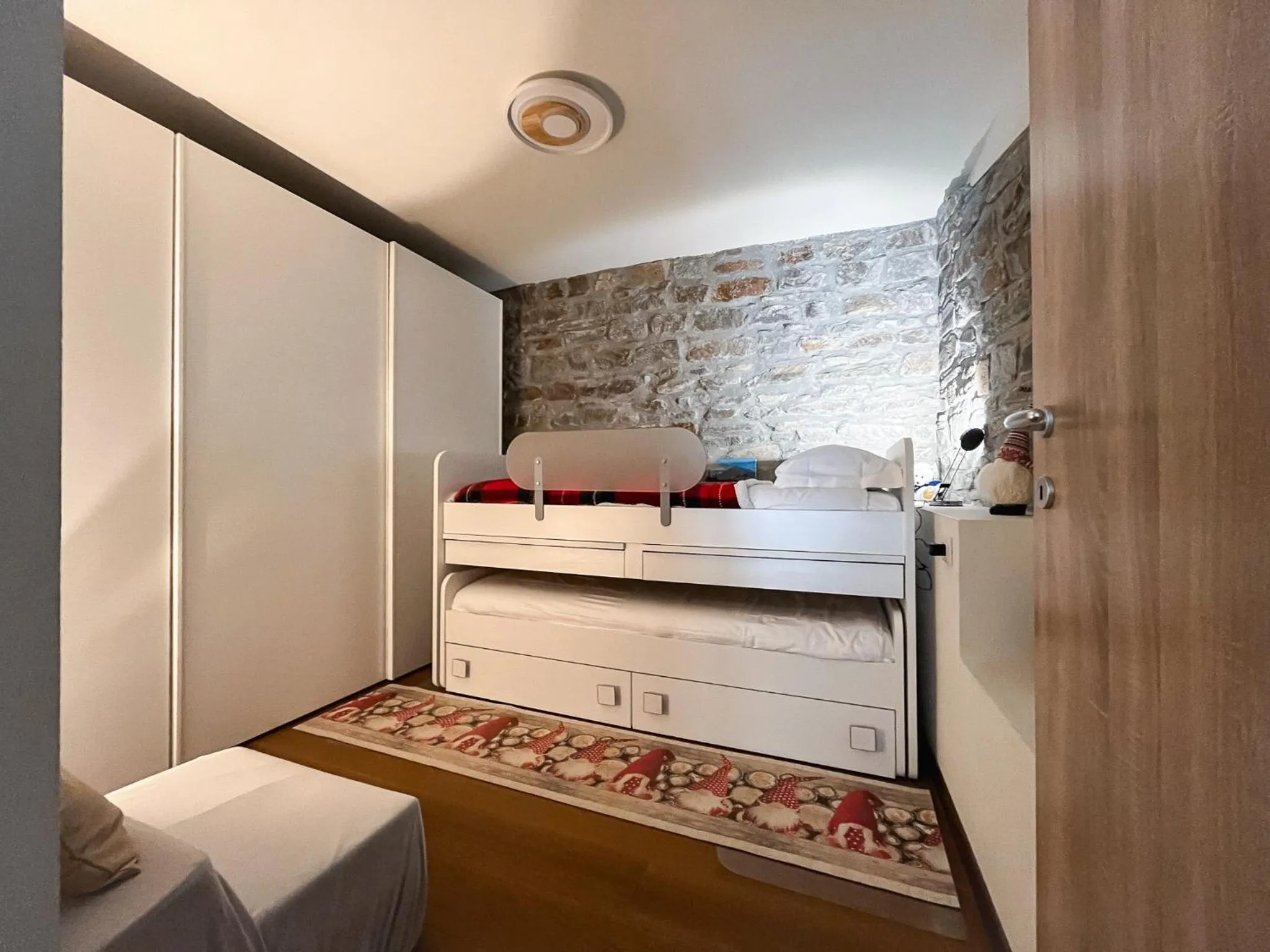 Bedroom in Maison Poluc hotel apartments