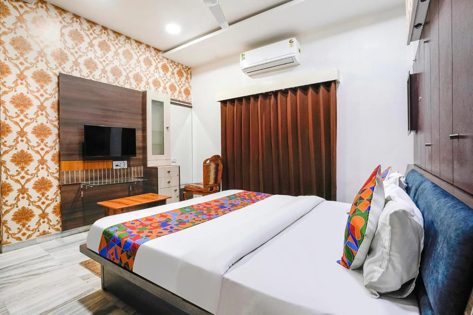 Bed in FabHotel Rest & Peace