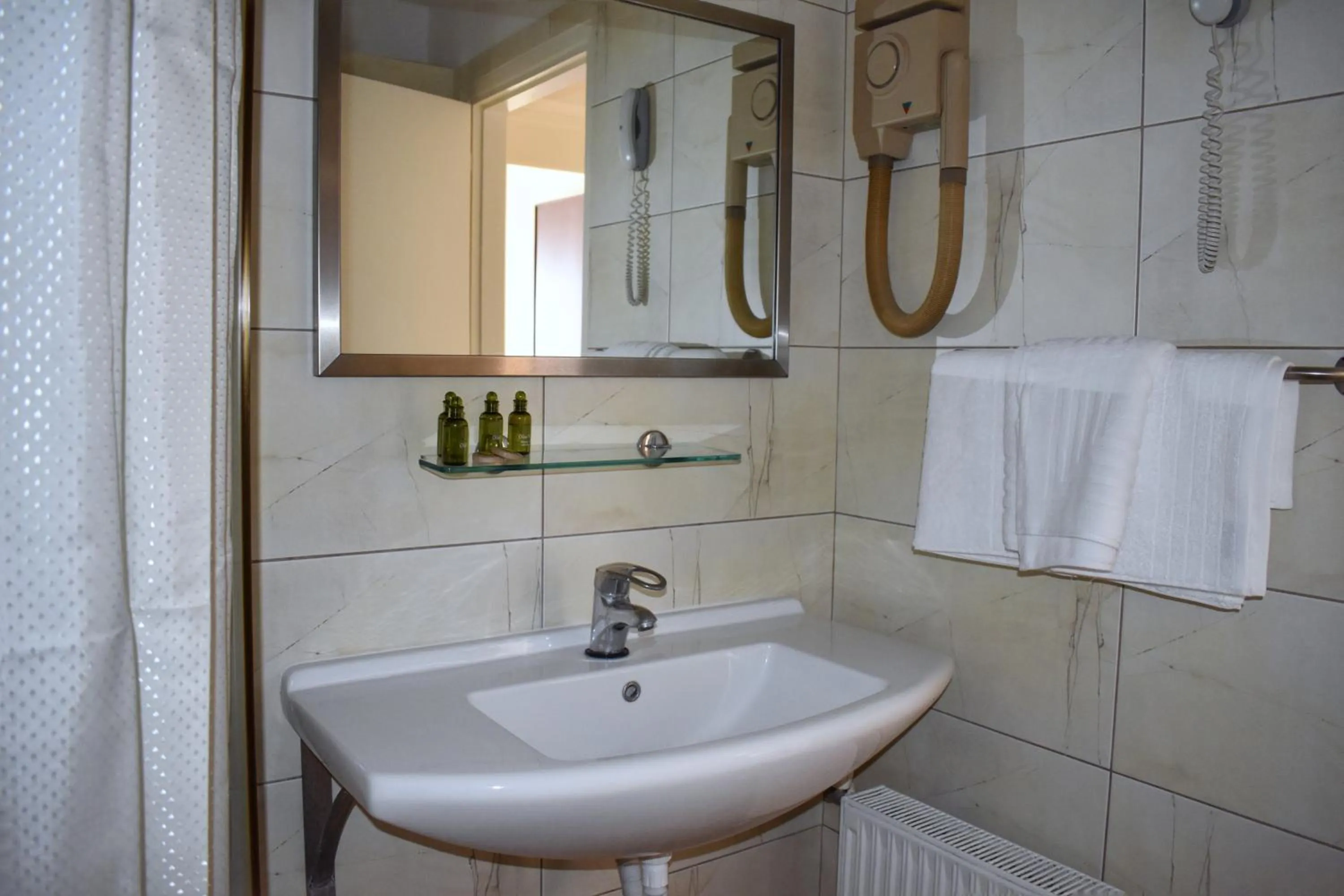 Bathroom in Hotel Theoxenia